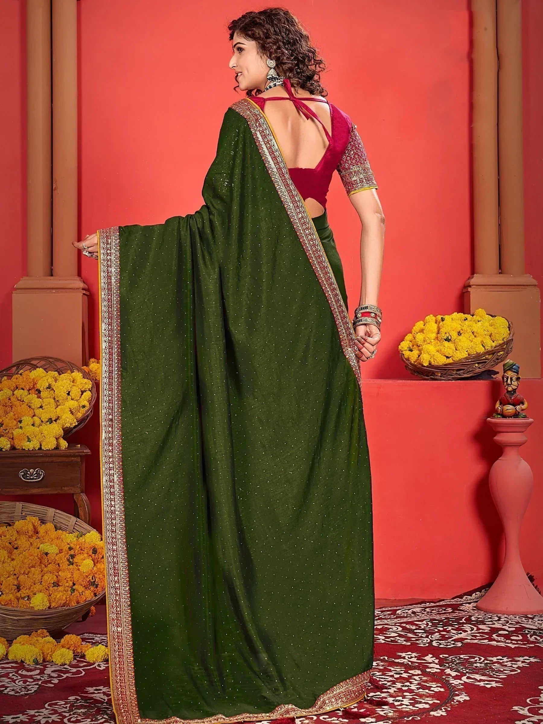 Green embroidered saree with red blouse, ethnic Indian wear for festive occasions