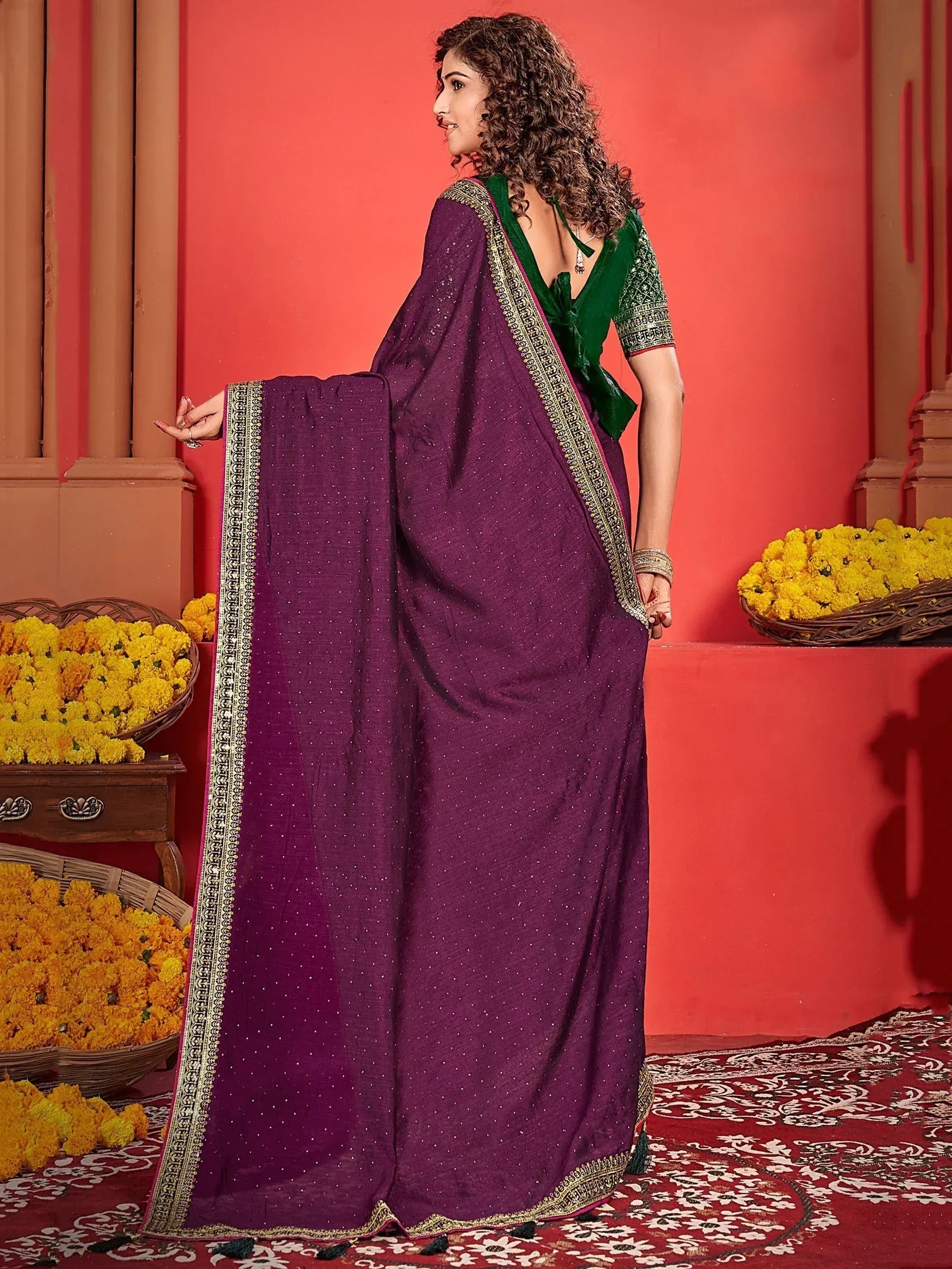 Purple embroidered saree with green blouse, perfect for Indian ethnic wear occasions