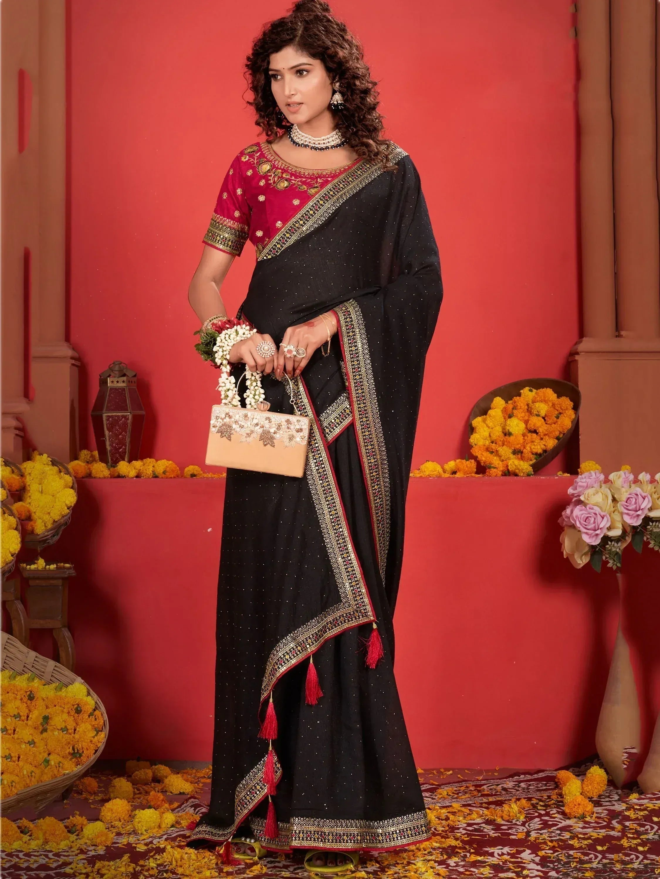 Black and red embroidered saree with gold border, perfect for Indian ethnic occasions and festivals