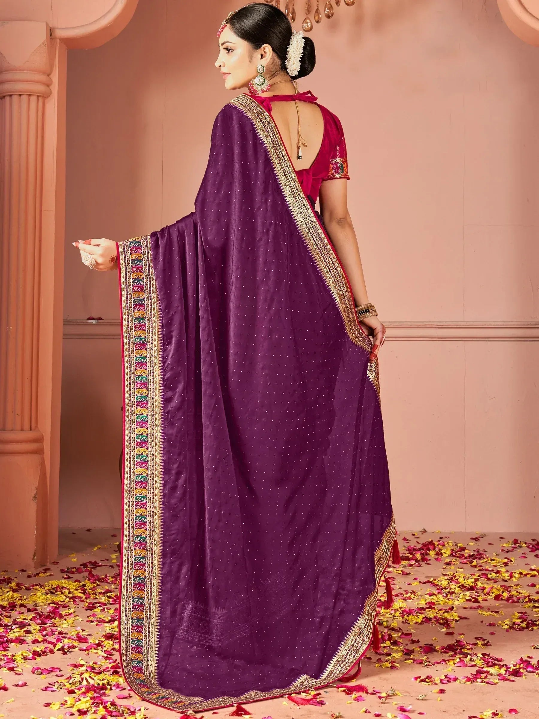 Purple ethnic saree with gold border and polka dots, paired with red blouse, perfect for Indian occasions.