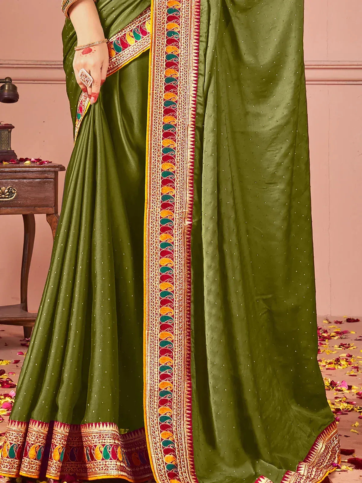 Olive green saree with colorful paisley border, perfect for Indian ethnic wear occasions