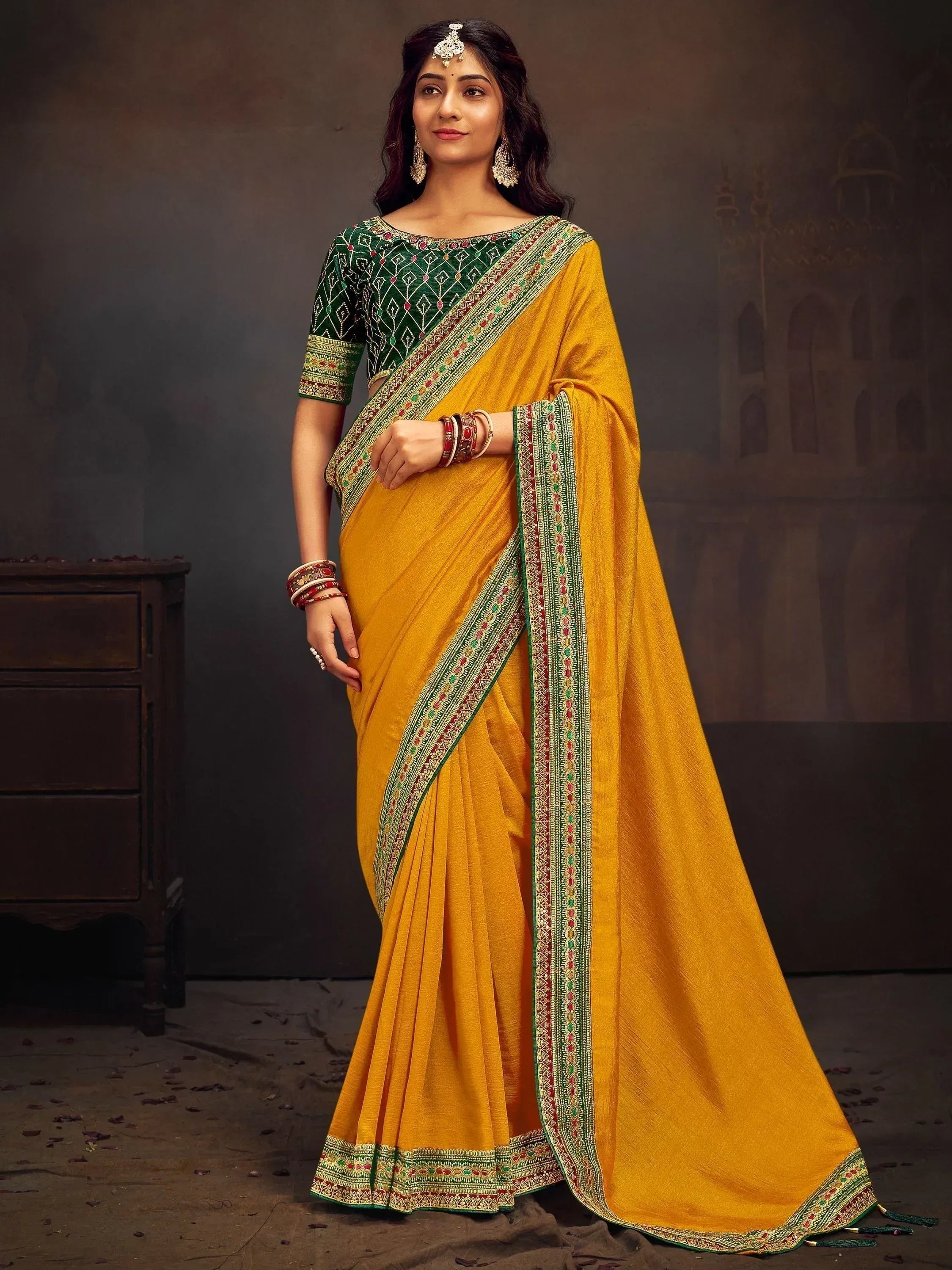 Yellow saree with green embroidered blouse, traditional Indian ethnic wear for women