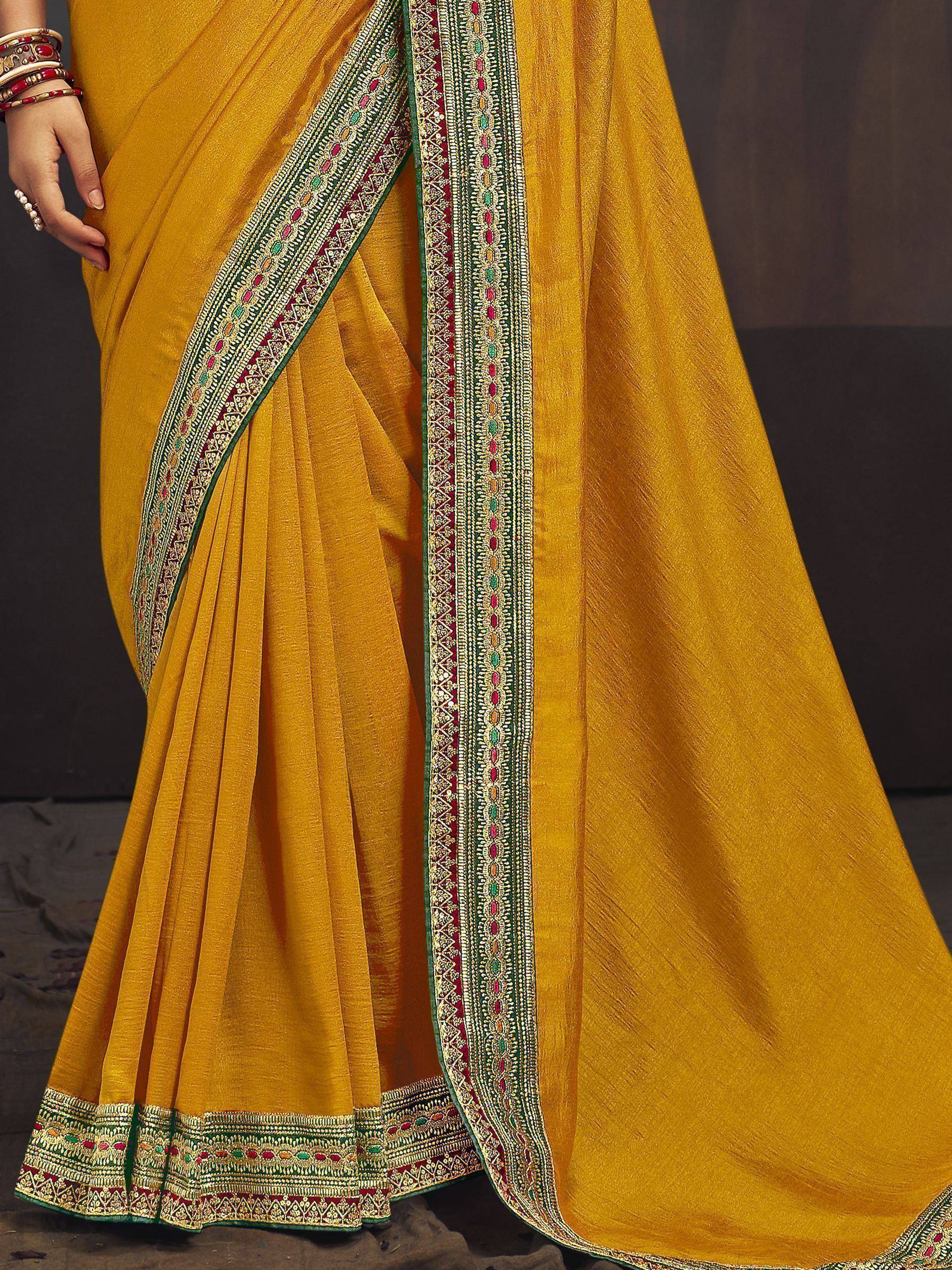 Mustard yellow saree with green and red embroidered border, Indian ethnic wear