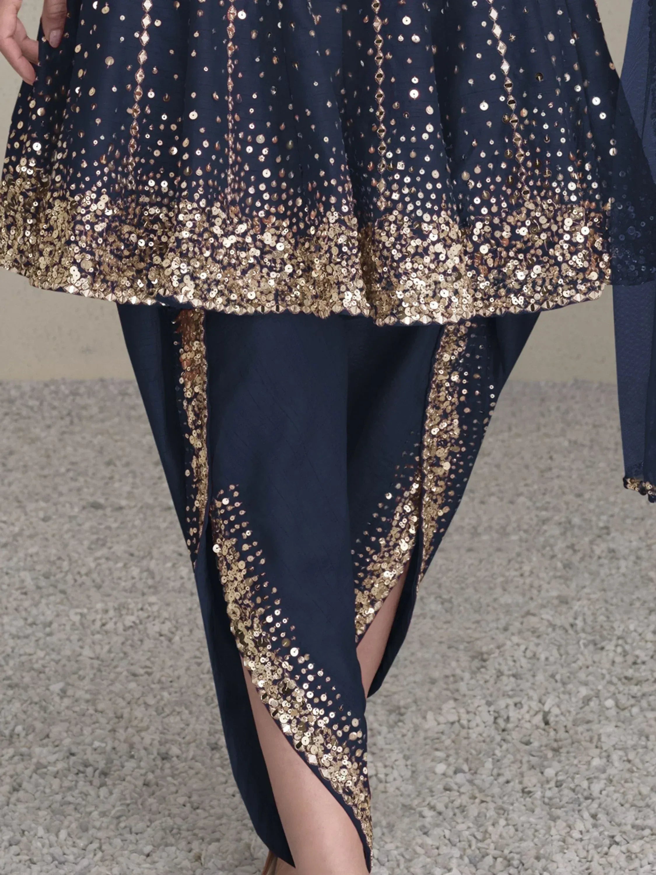 Navy blue ethnic gown with gold sequin detailing, perfect for festive occasions and parties.