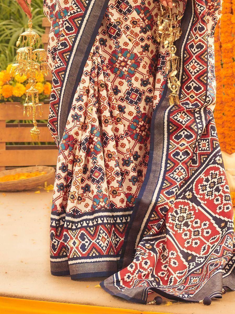 Ethnic printed saree with geometric floral patterns, perfect for Indian festive occasions
