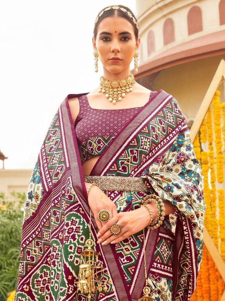 Lovable Off-White & Purple Patola Printed Silk Function Wear Saree