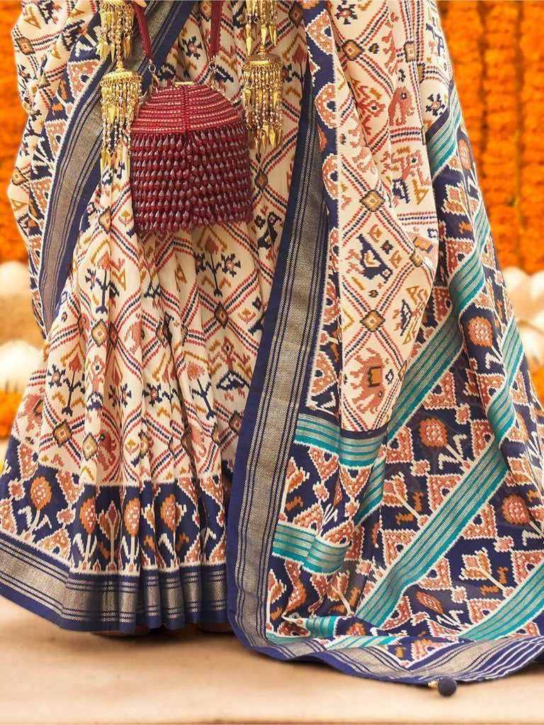 Awesome Cream & Blue Patola Printed Silk Festival Wear Saree