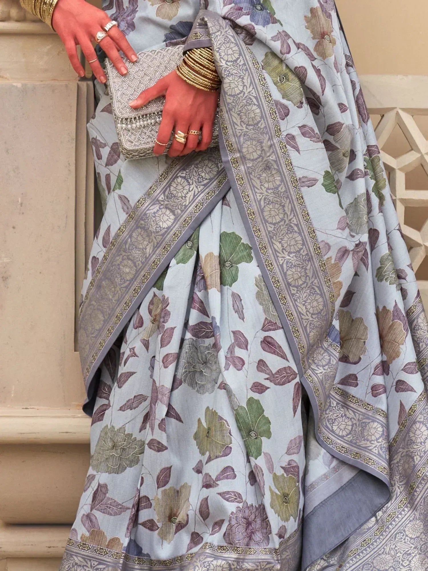 Light blue floral saree with intricate border, perfect for Indian ethnic wear occasions