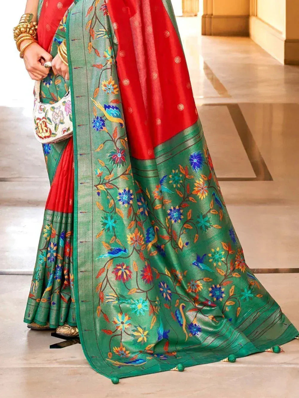 Green and red floral embroidered saree with bird motifs, ethnic Indian wear