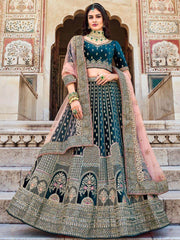 Enchanting Teal Blue Embroidered Velvet Bridal Wear Lehenga Choli
