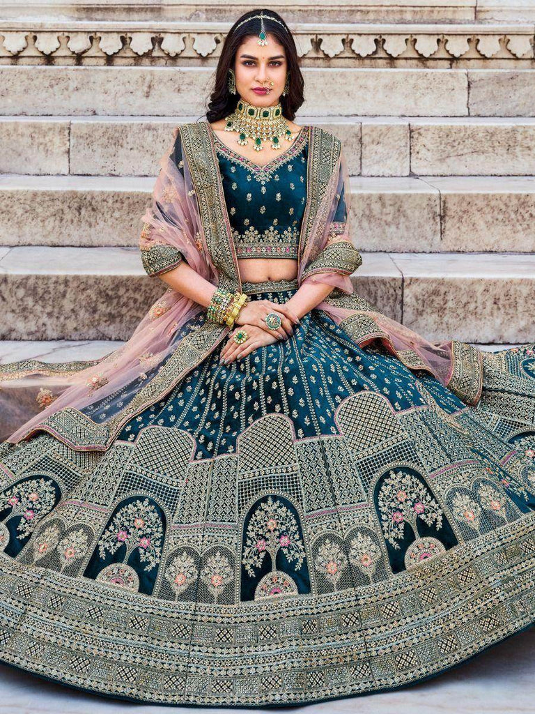 Enchanting Teal Blue Embroidered Velvet Bridal Wear Lehenga Choli