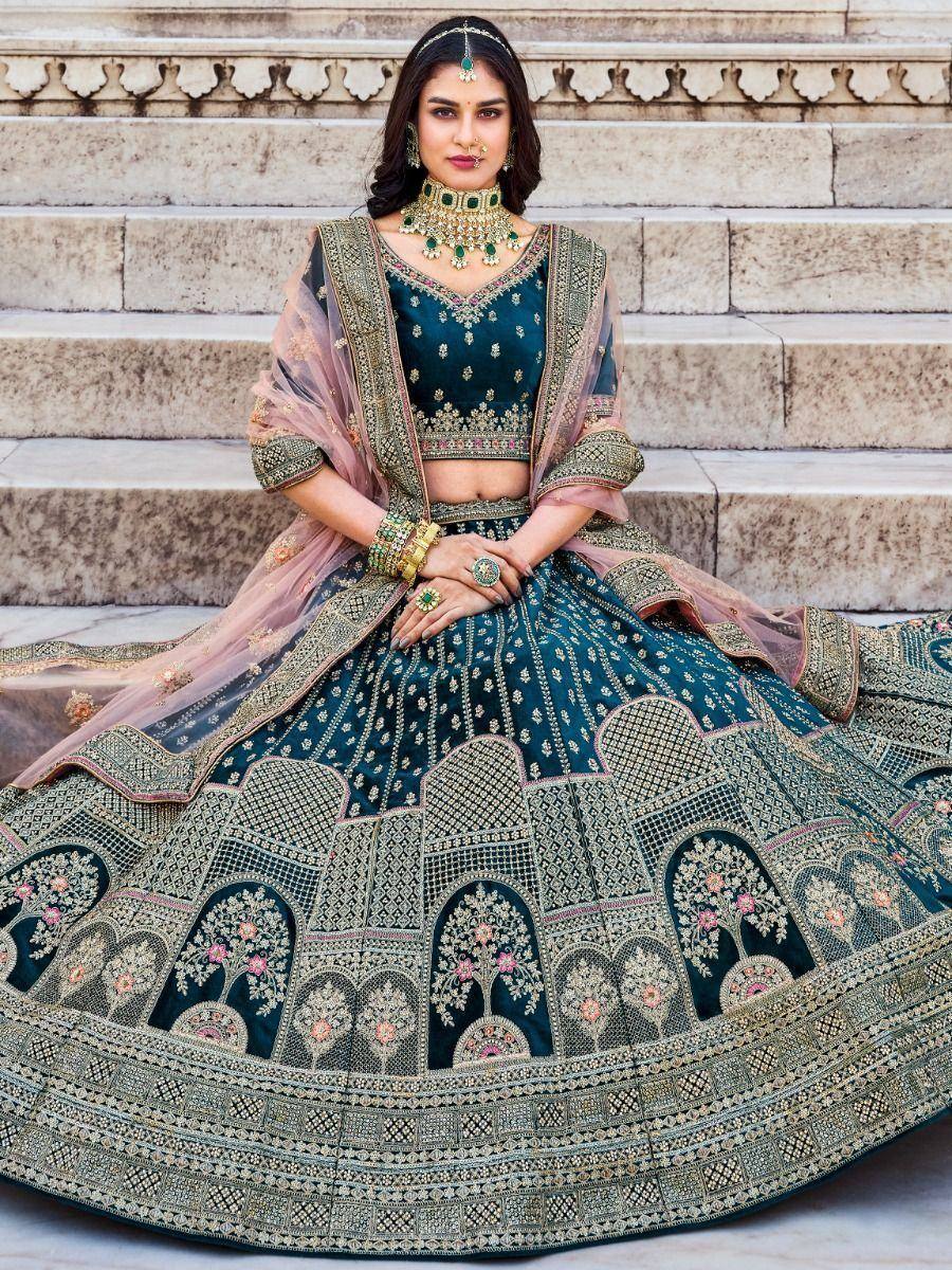 Elegant teal lehenga choli with gold embroidery, perfect for Indian weddings and festive occasions.