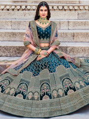 Enchanting Teal Blue Embroidered Velvet Bridal Wear Lehenga Choli