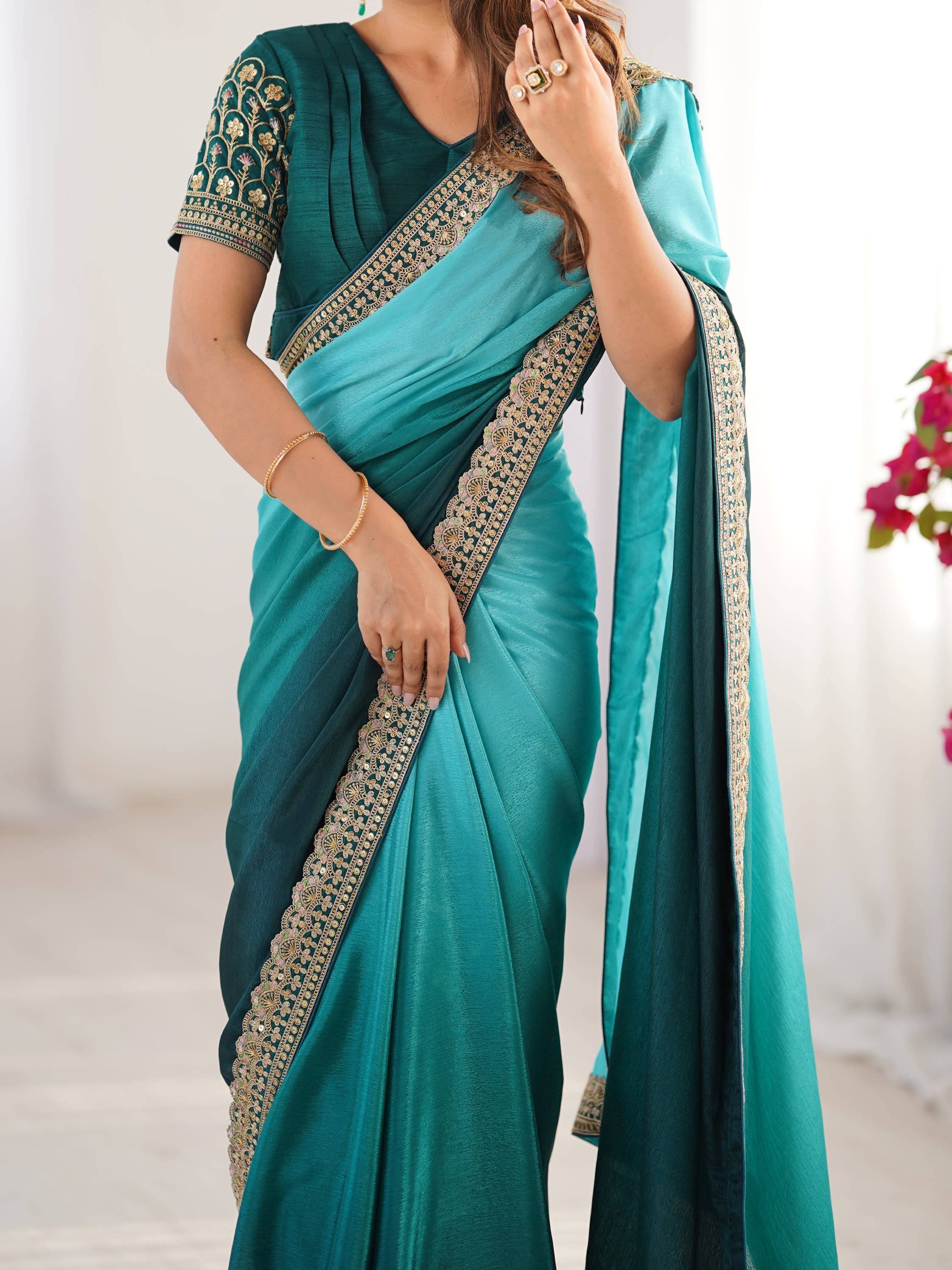 Teal embroidered saree with gold border, designer Indian ethnic wear for women