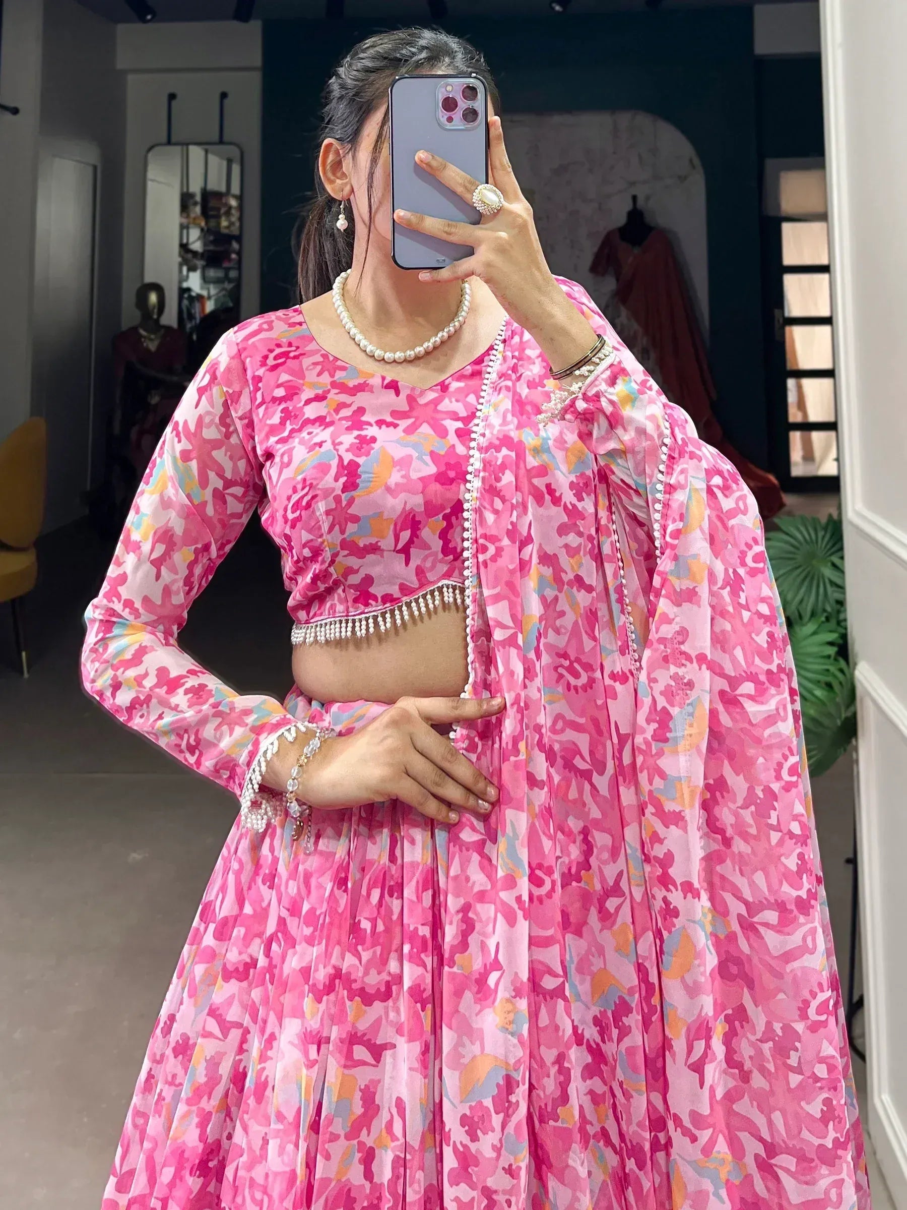 Pink floral lehenga choli with pearl detailing, perfect for Indian ethnic wear occasions