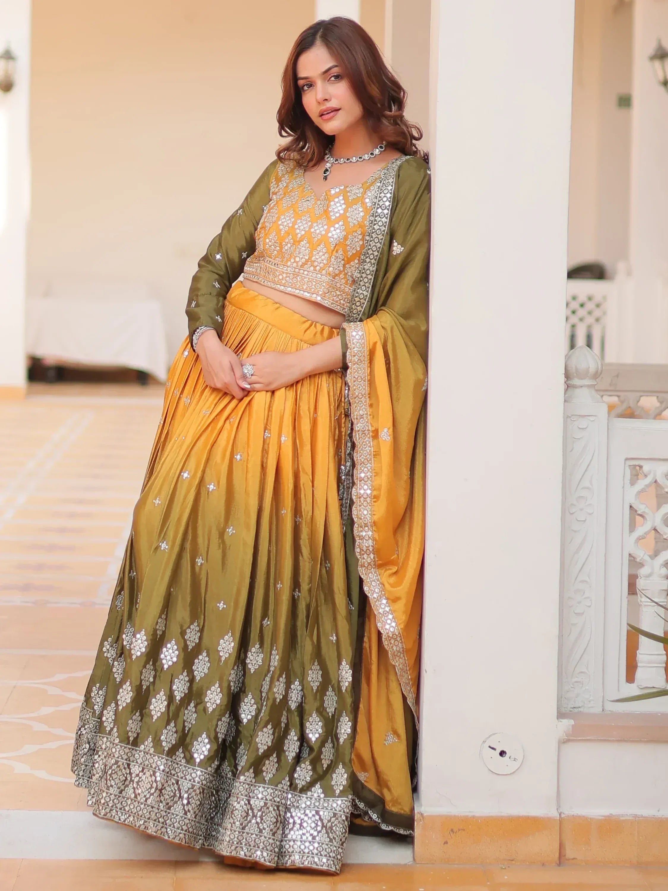 Olive and mustard designer lehenga choli with silver embroidery, perfect for Indian ethnic wear occasions