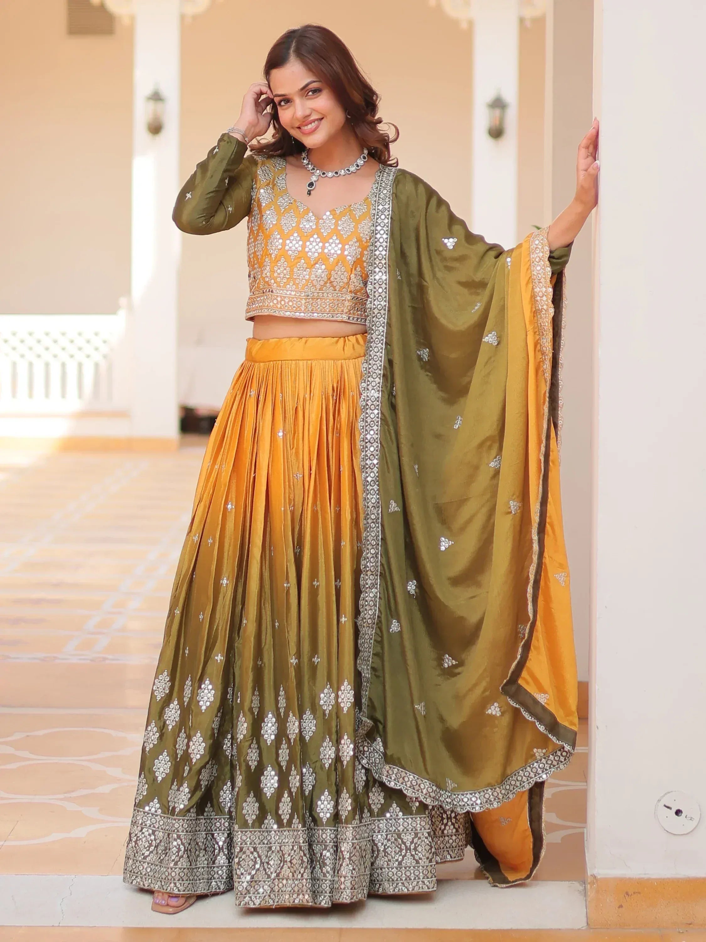 Mustard and olive green embroidered lehenga choli with mirror work, perfect for Indian ethnic occasions