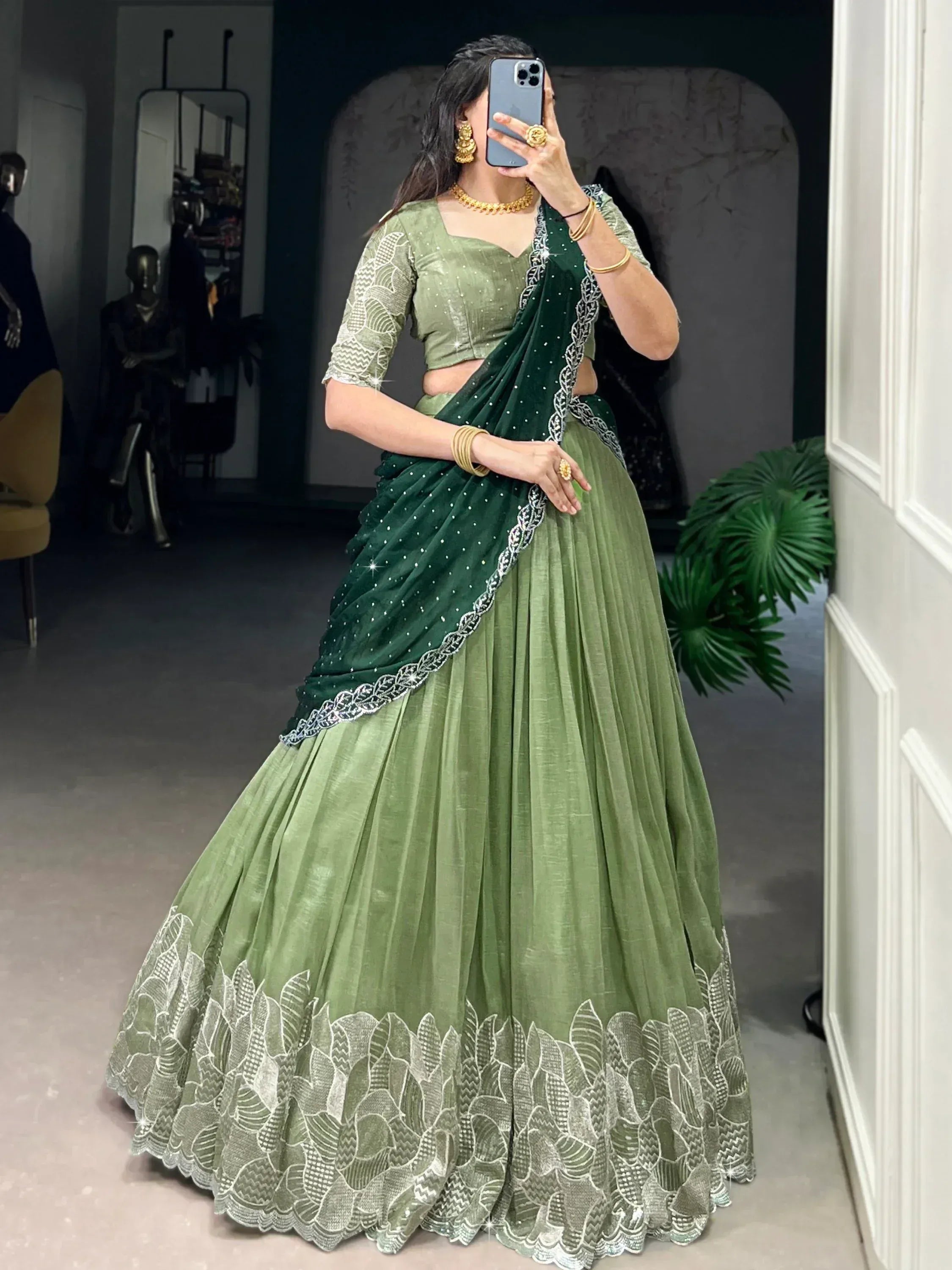 Green designer lehenga choli with embroidered dupatta, perfect for Indian ethnic wear occasions