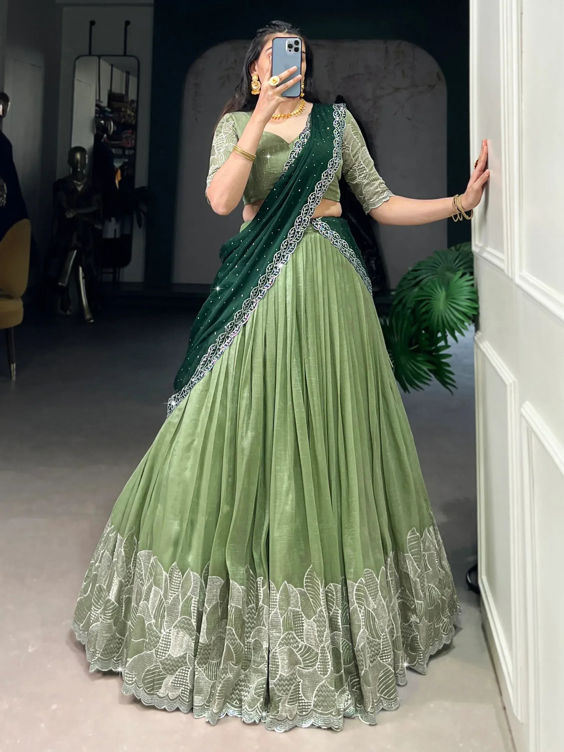 Green designer lehenga choli with embroidered dupatta, perfect for Indian ethnic wear occasions