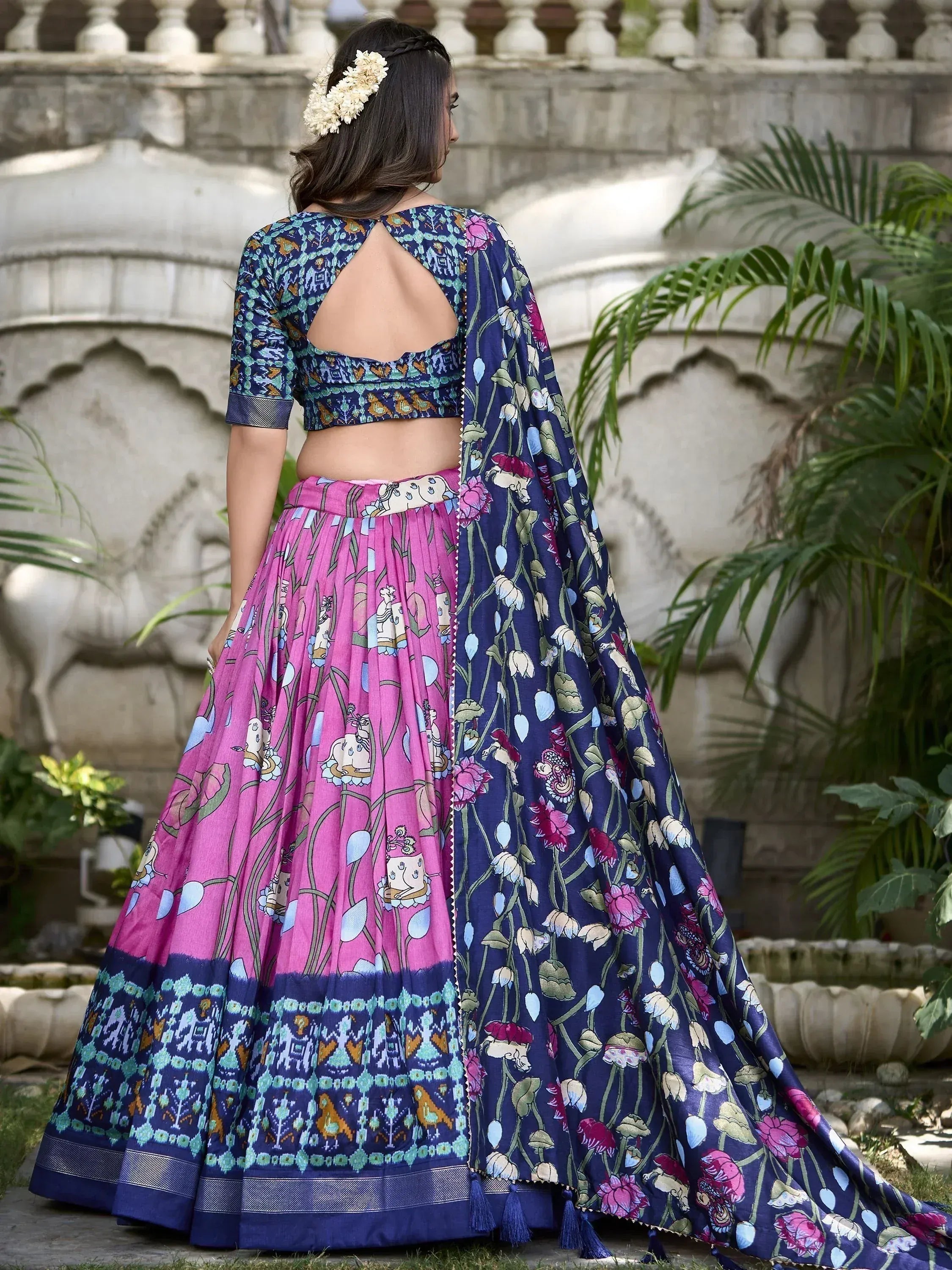 Pink and navy floral lehenga choli with back cutout, perfect for Indian ethnic occasions
