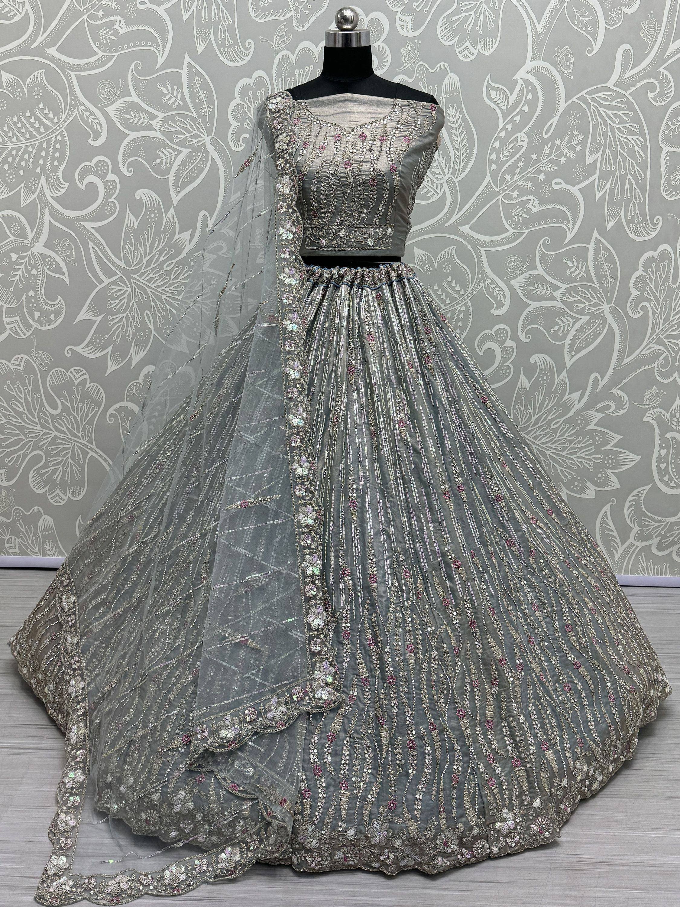 Grey designer lehenga choli with heavy embroidery and sequins, perfect for weddings and festive occasions