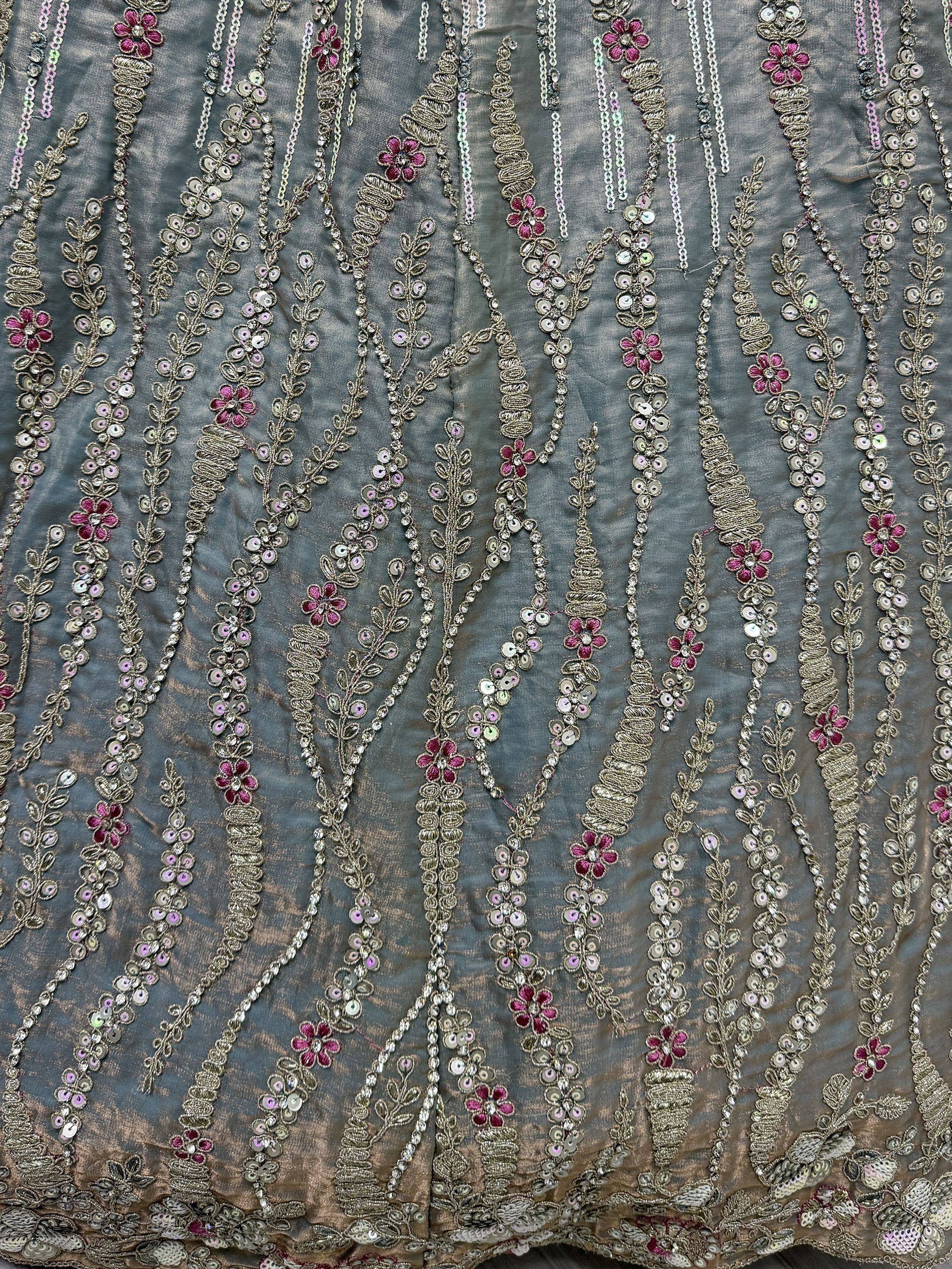 Grey ethnic wear with pink floral embroidery, sequins, and gold thread detailing for festive occasions