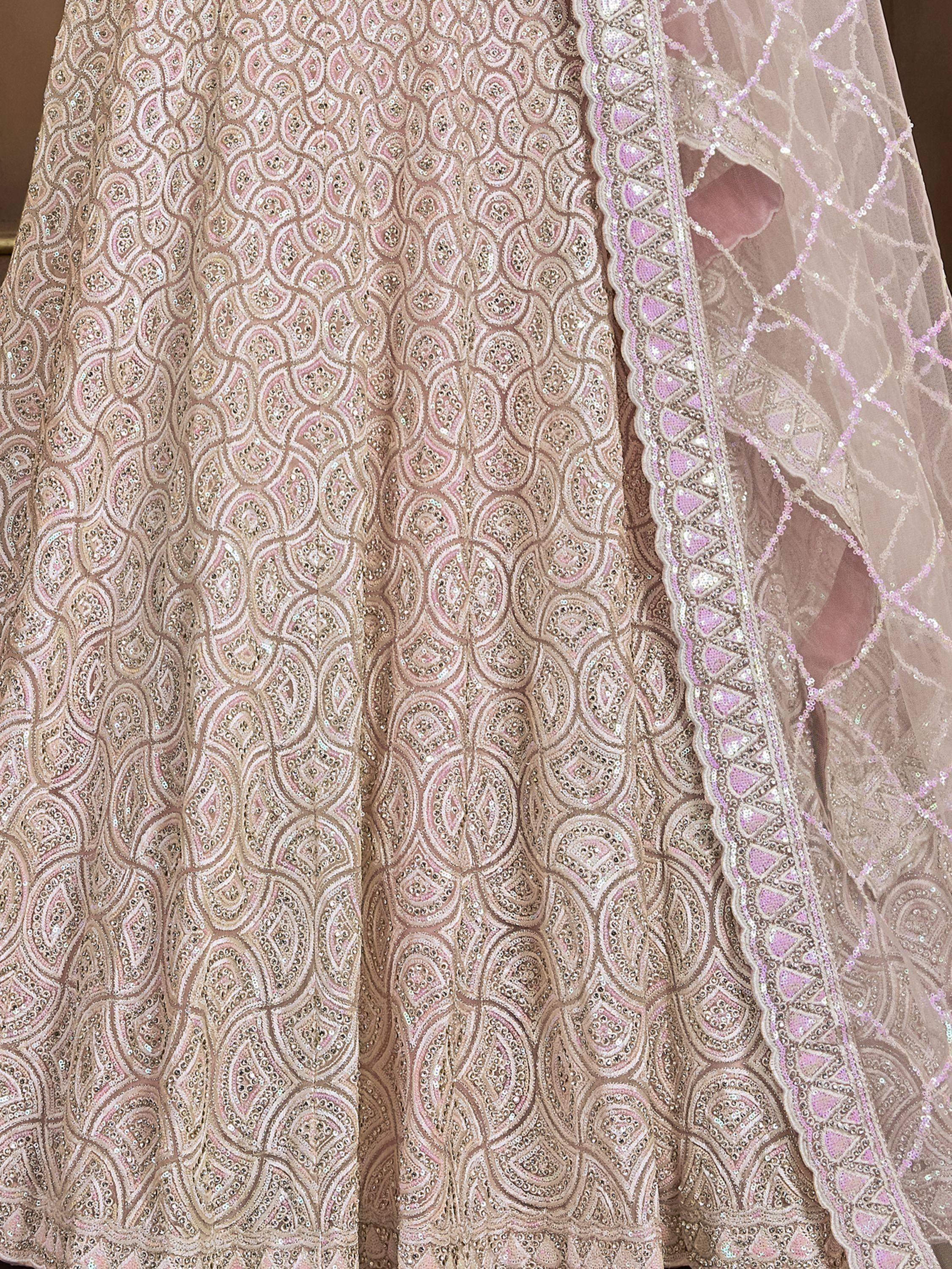 Elegant beige lehenga with intricate pink and silver embroidery and sequin dupatta
