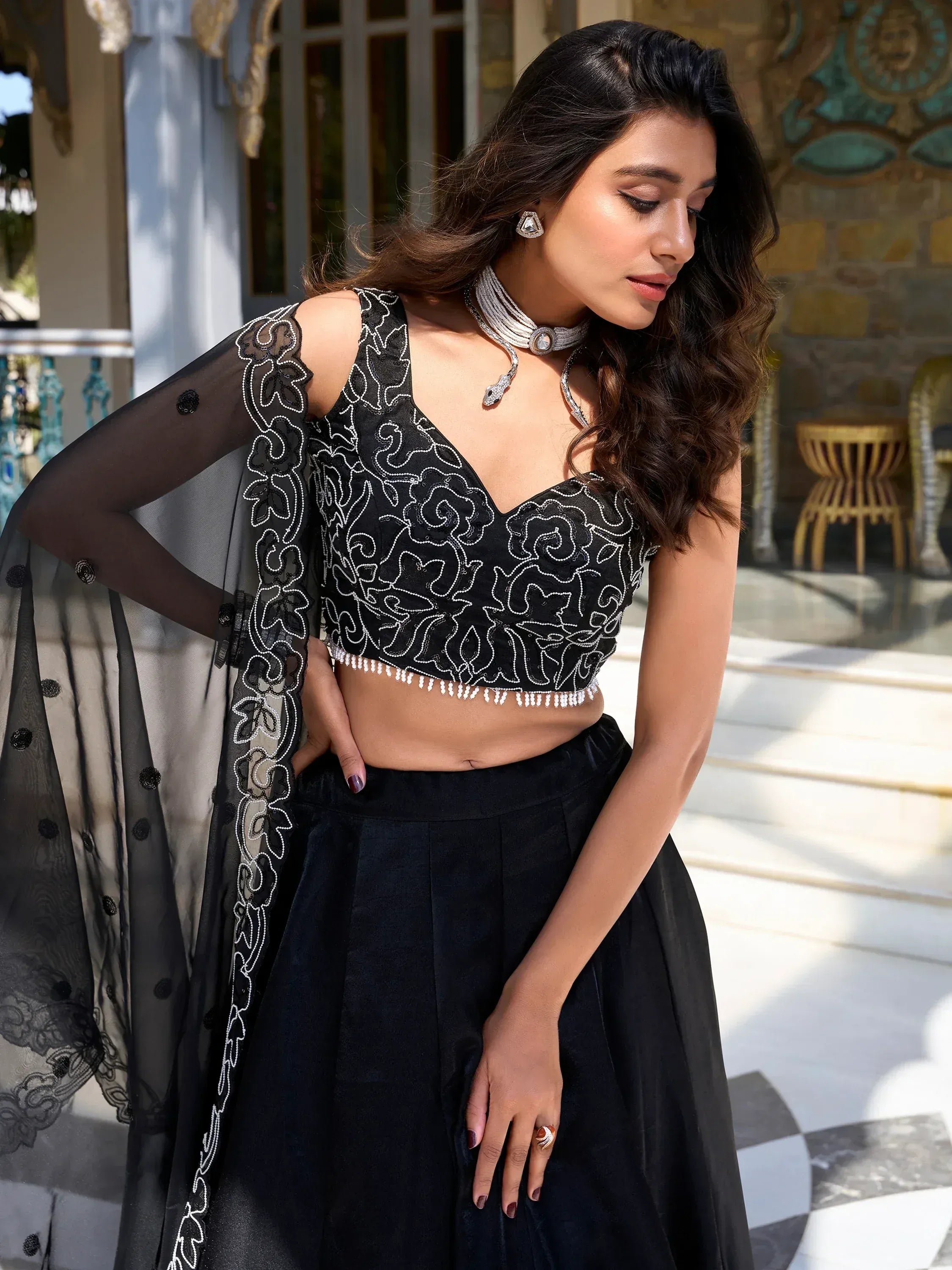 Black embroidered lehenga choli with sheer dupatta, perfect for Indian ethnic wear events