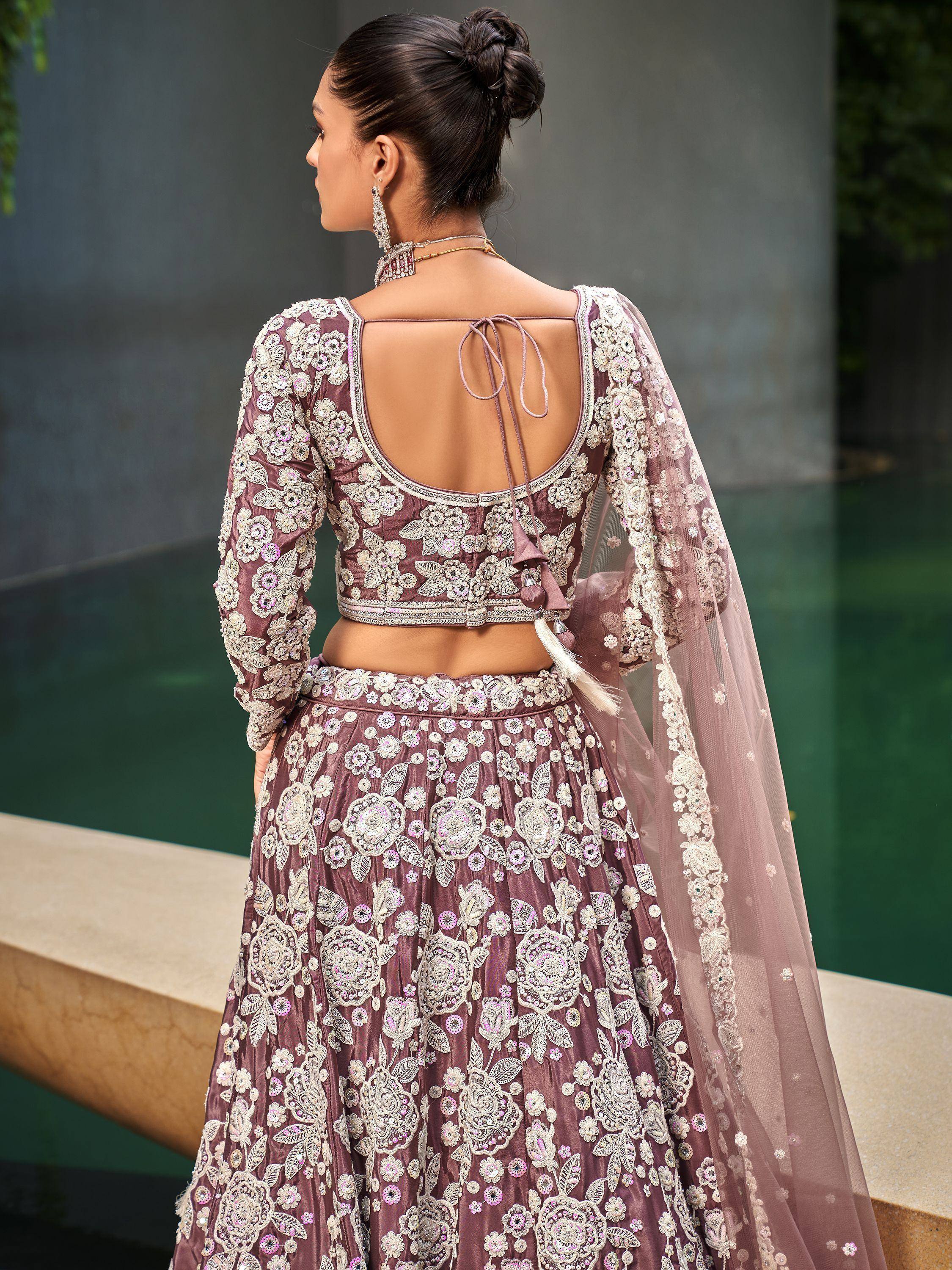 Elegant mauve lehenga choli with floral embroidery, back tie blouse, and sheer dupatta for Indian ethnic wear
