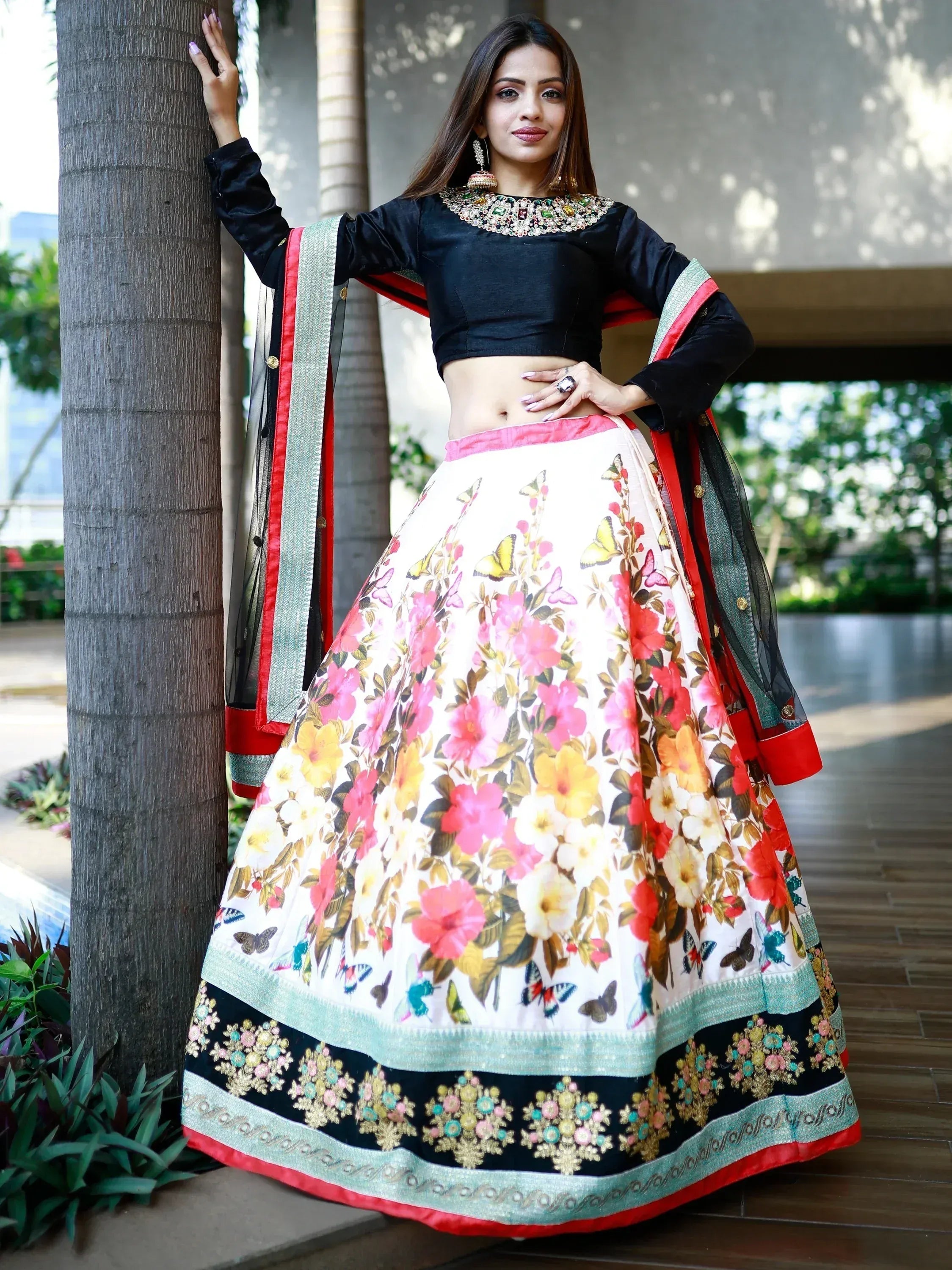 Floral print lehenga choli with black velvet blouse, perfect for Indian ethnic wear occasions.