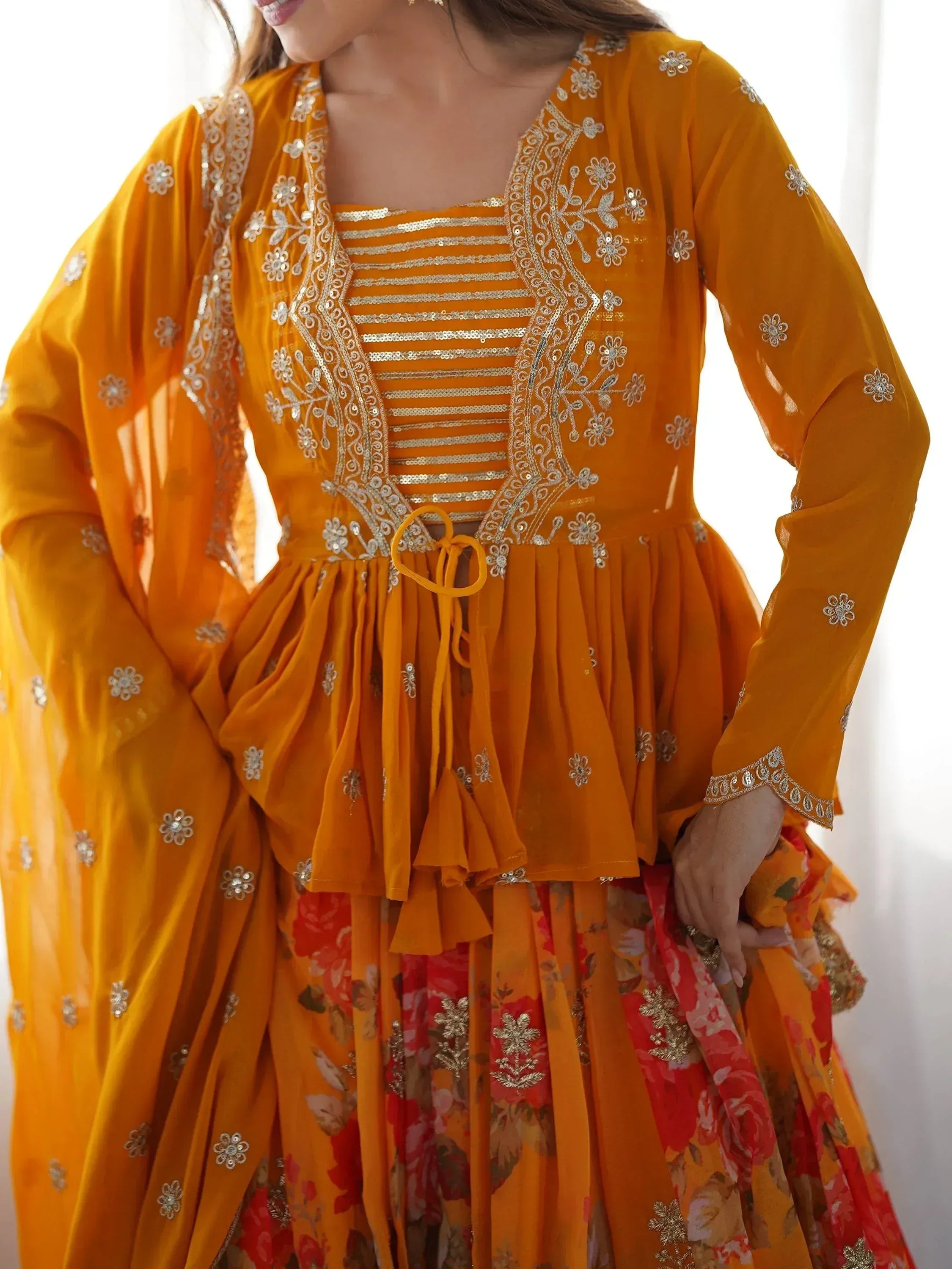 Mustard yellow embroidered lehenga choli with floral dupatta, perfect for Indian ethnic wear occasions