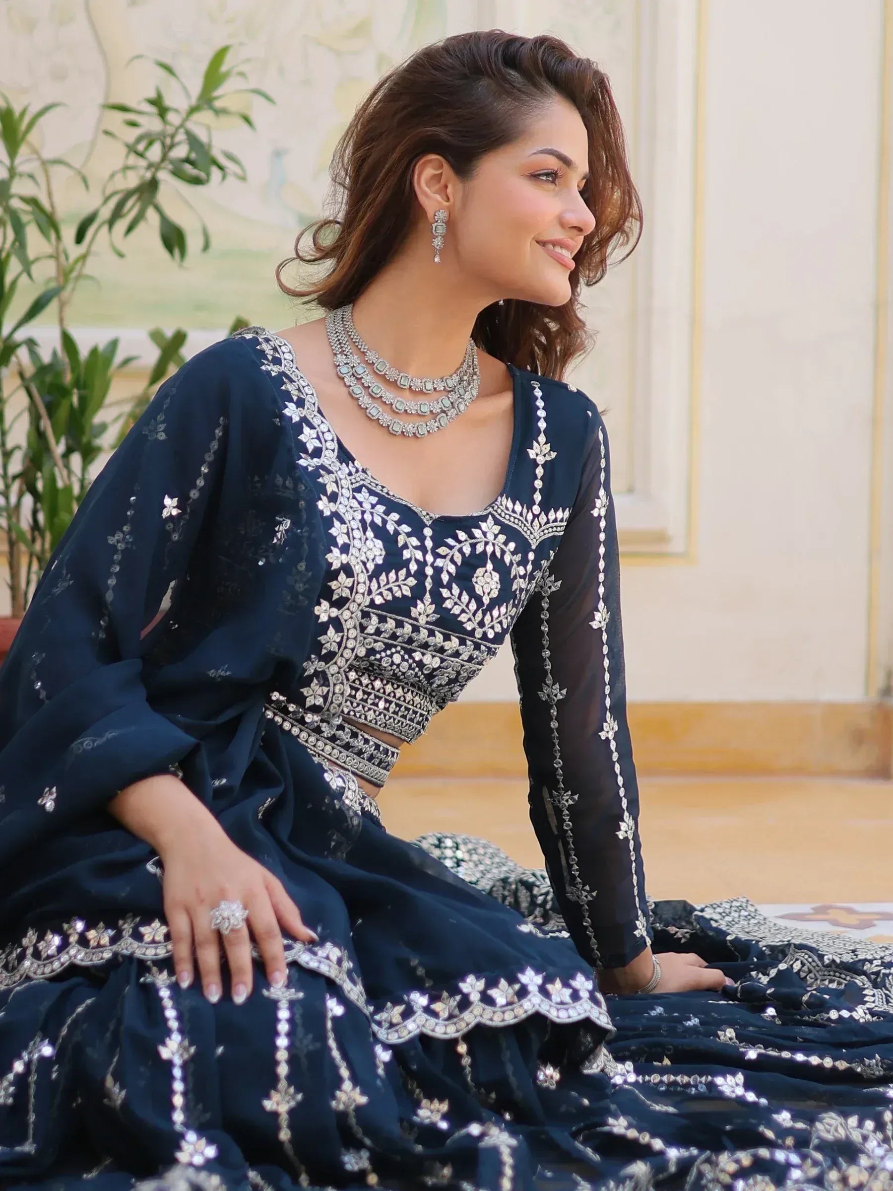 Elegant navy blue embroidered lehenga choli with silver detailing, perfect for Indian ethnic wear occasions