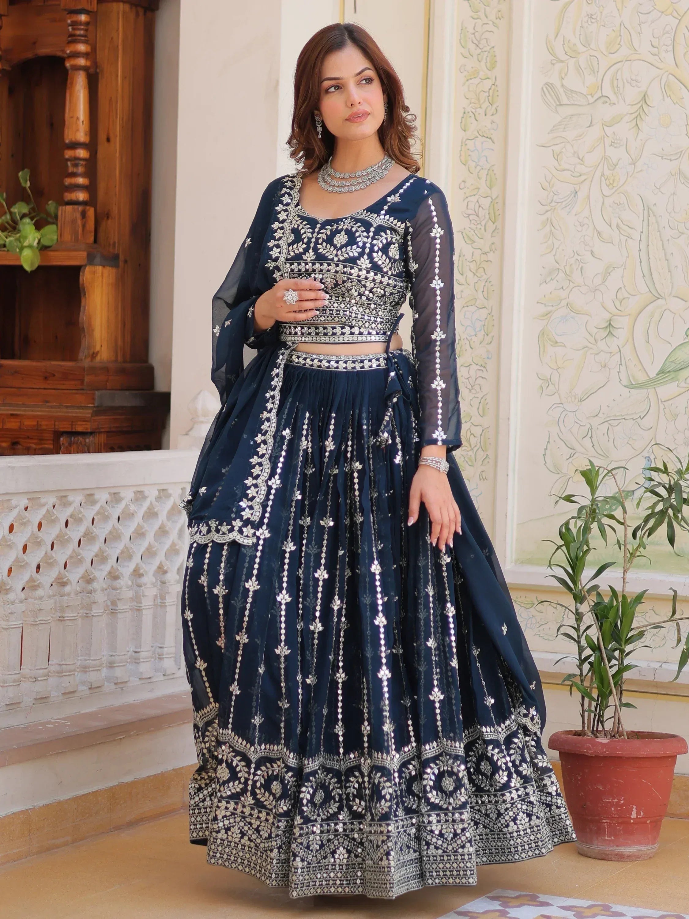 Navy blue designer lehenga choli with silver embroidery, perfect for Indian ethnic wear occasions