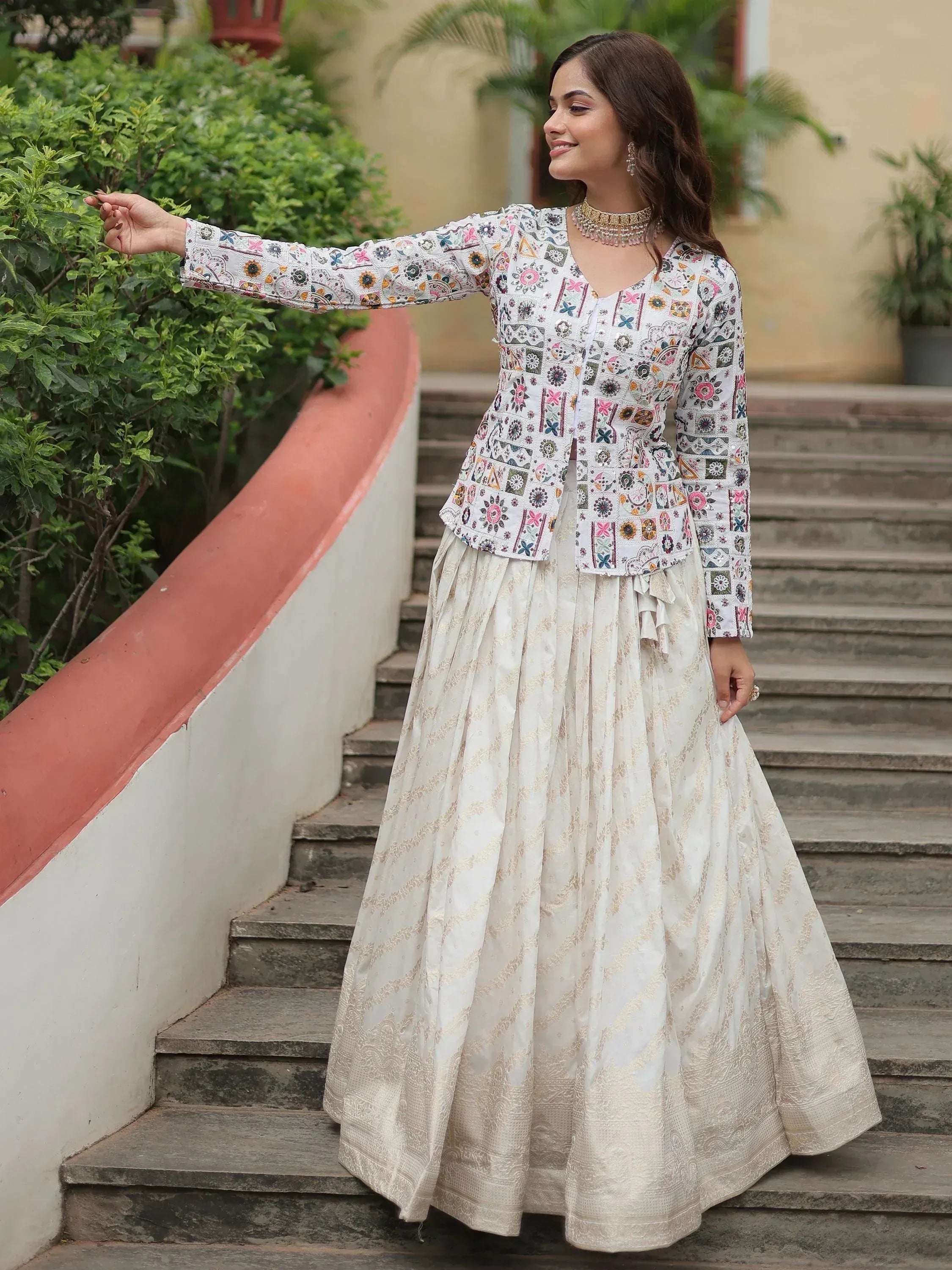 Woman in floral embroidered kurta with gold brocade lehenga, Indian ethnic wear