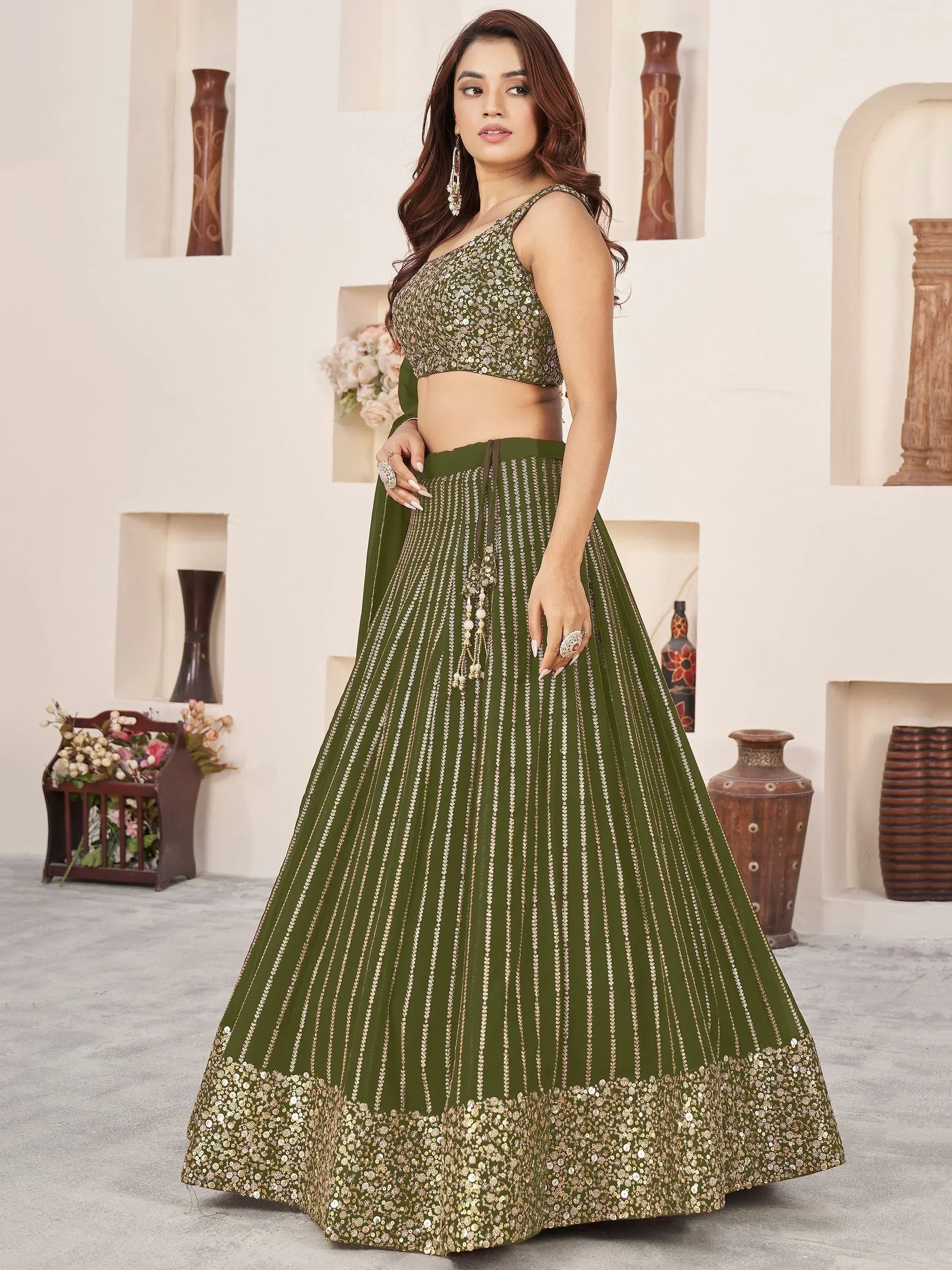 Olive green designer lehenga choli with sequin work, perfect for Indian ethnic wear and festive occasions.