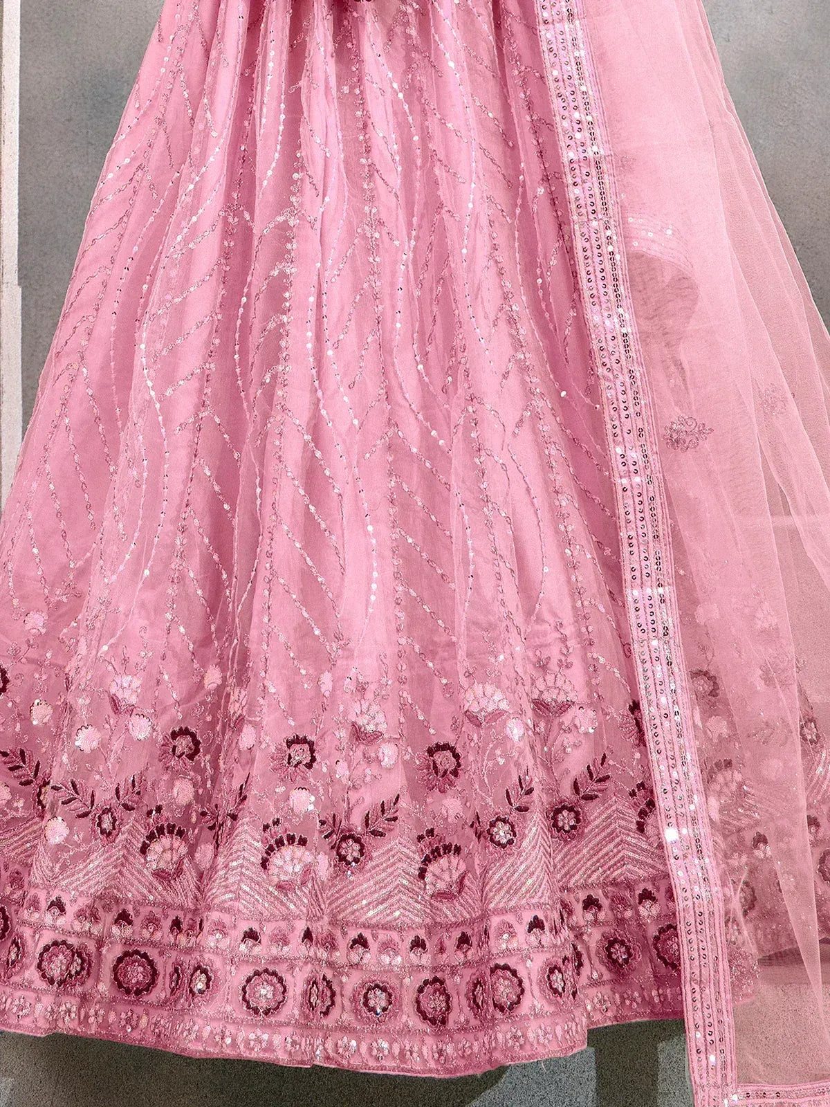 Pink designer lehenga with floral embroidery and sequin detailing, perfect for ethnic occasions