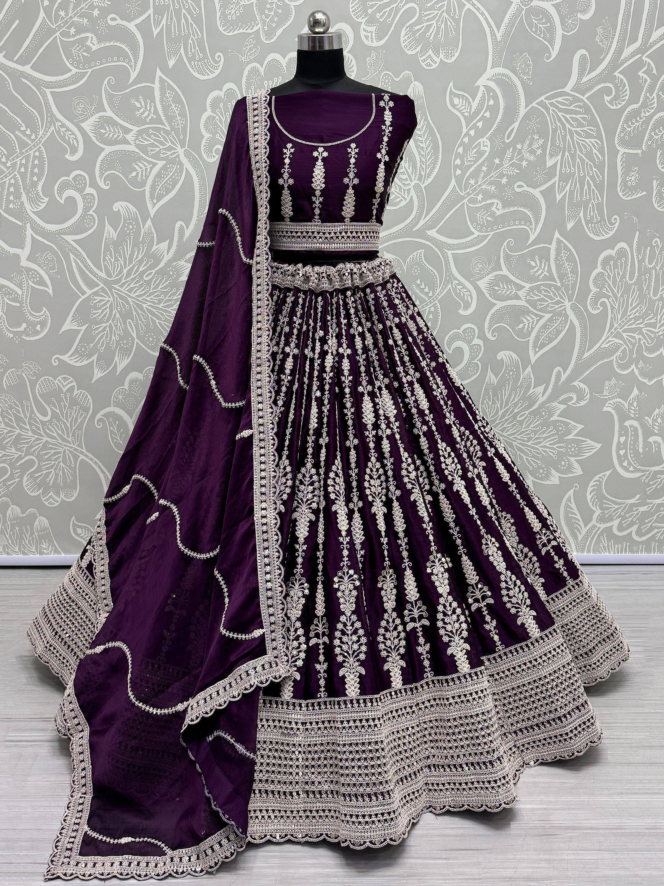 Purple designer lehenga choli with silver embroidery, perfect for Indian ethnic wear occasions.