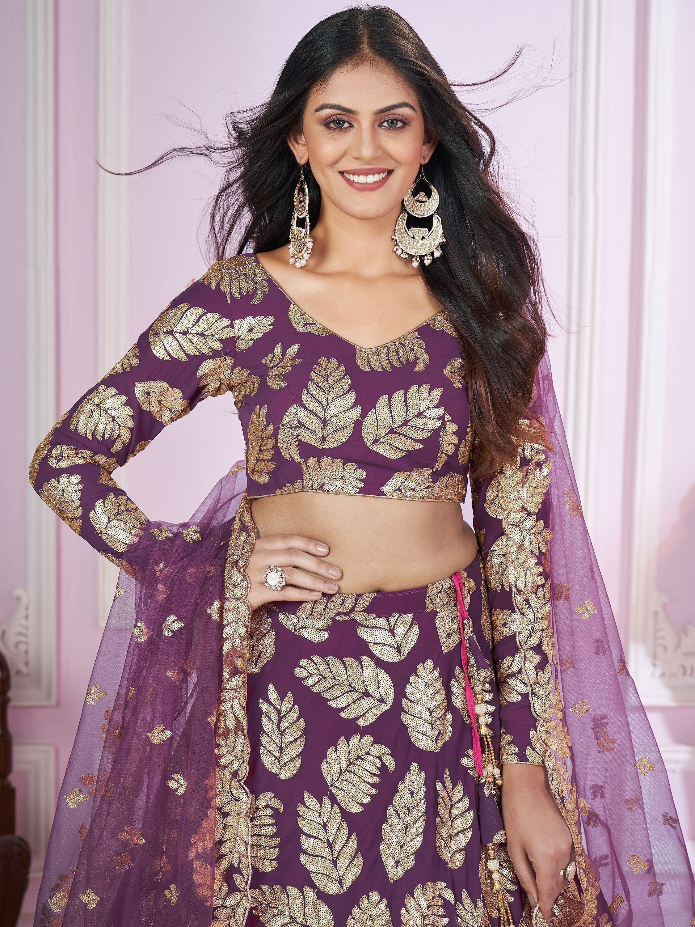 Purple lehenga choli with gold leaf embroidery, perfect for Indian ethnic wear and festive occasions.