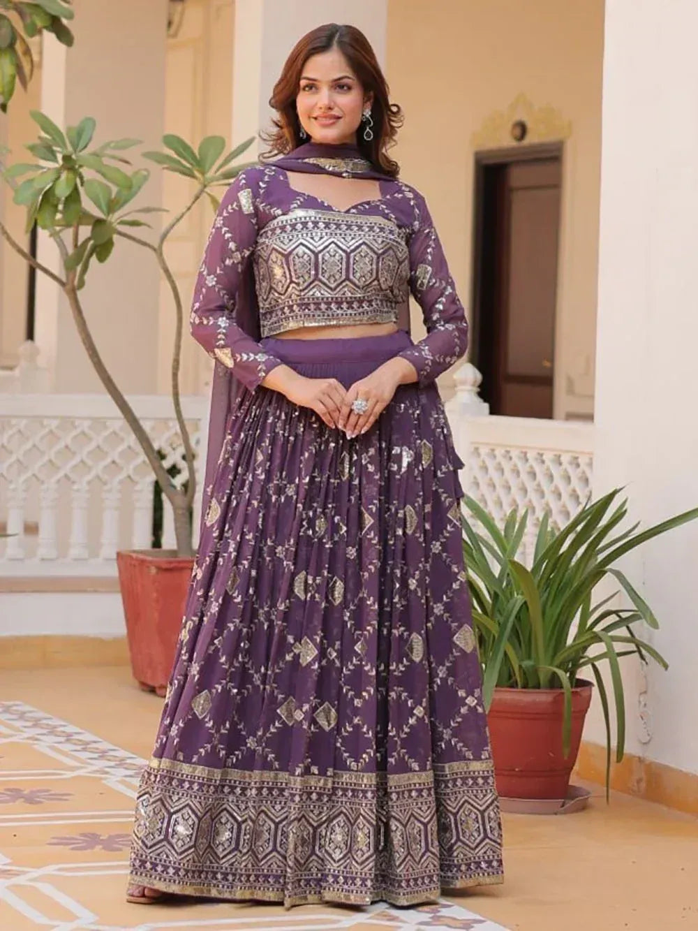 Purple embroidered lehenga choli with geometric patterns, perfect for Indian ethnic wear occasions