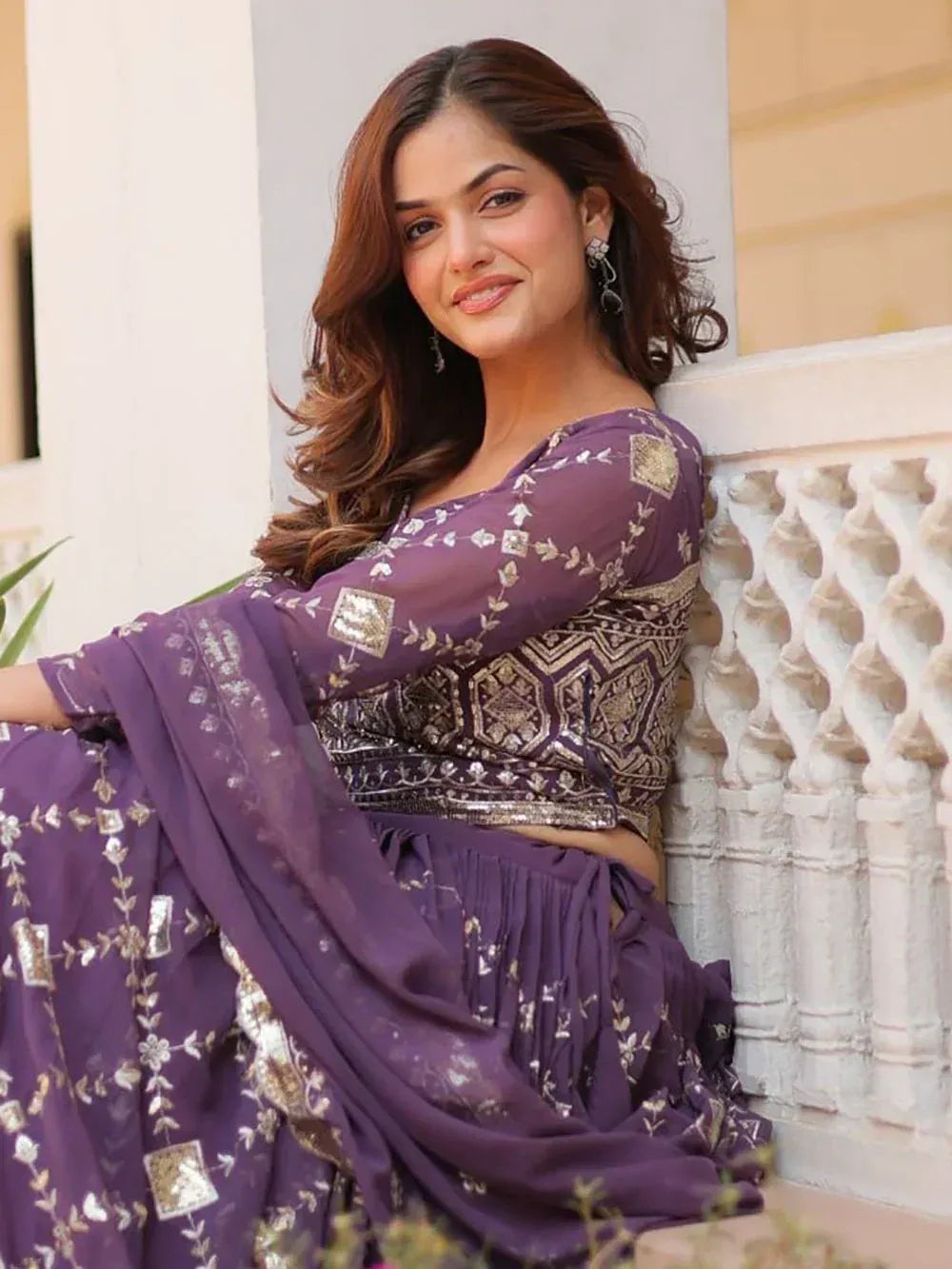 Purple embroidered lehenga choli with gold detailing, perfect for Indian ethnic wear occasions