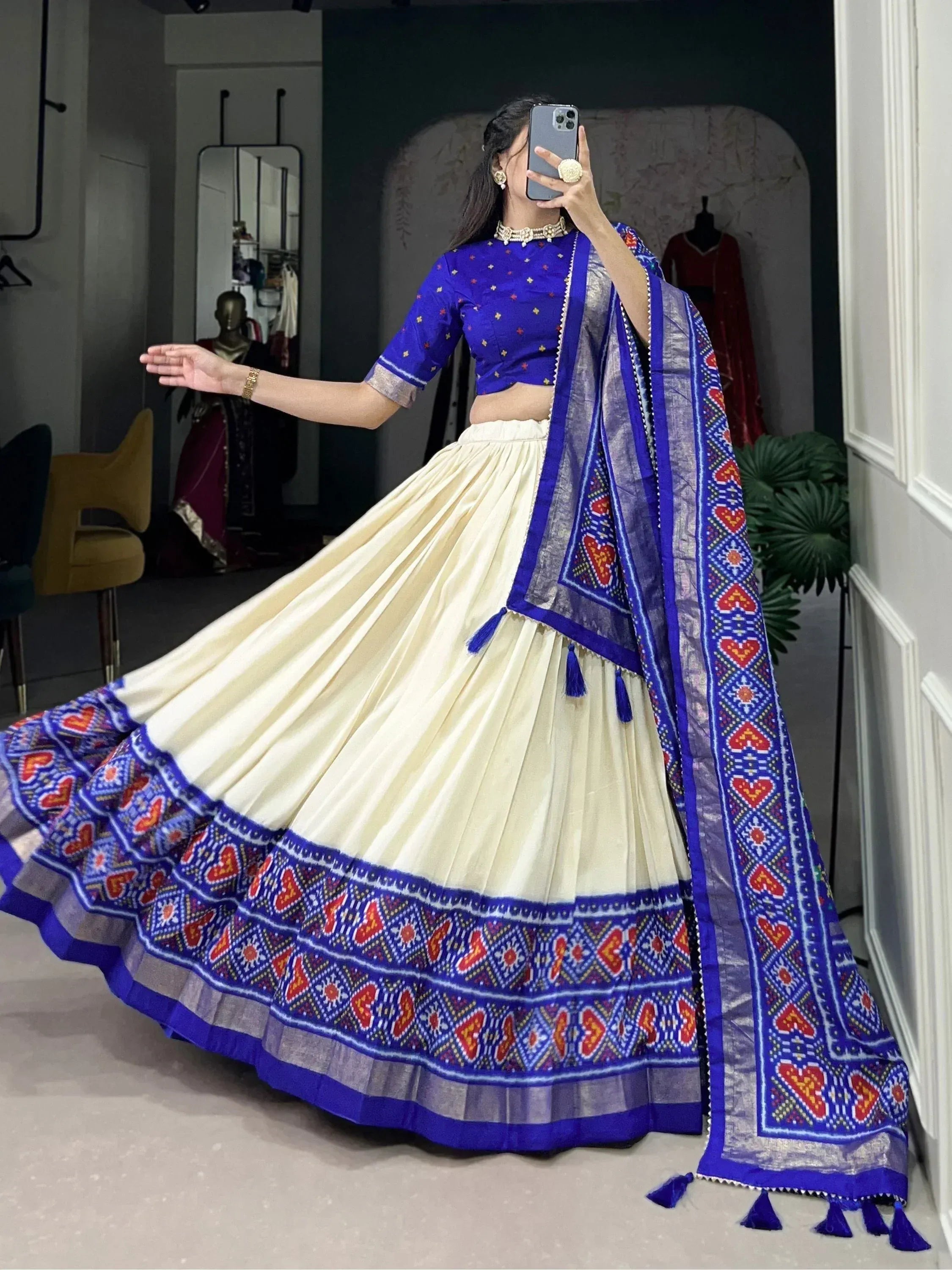 Blue and cream ethnic lehenga choli with heart print dupatta, perfect for Indian weddings or festivals.