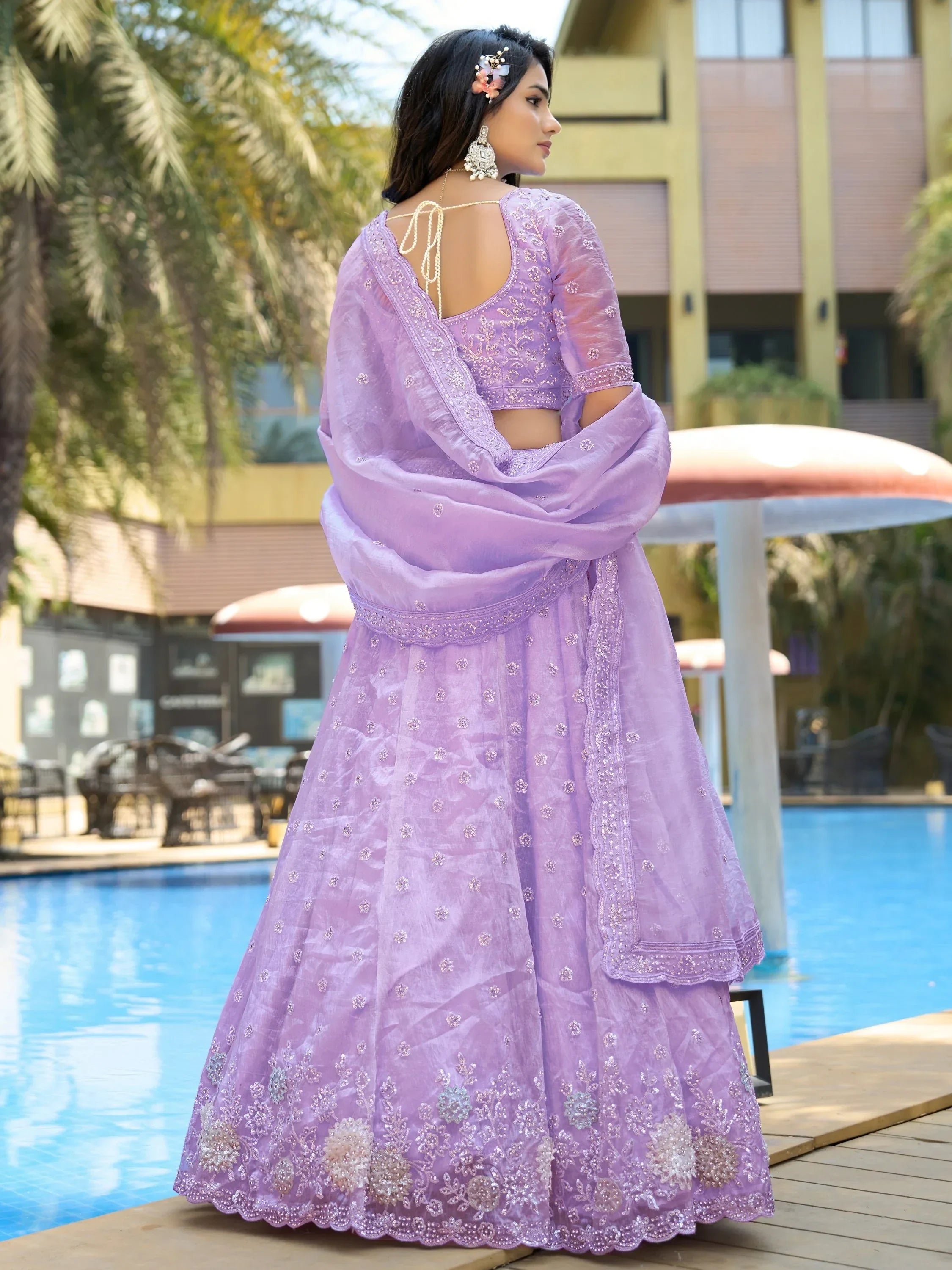 Lavender embroidered lehenga choli with floral detailing, perfect for Indian ethnic wear occasions.