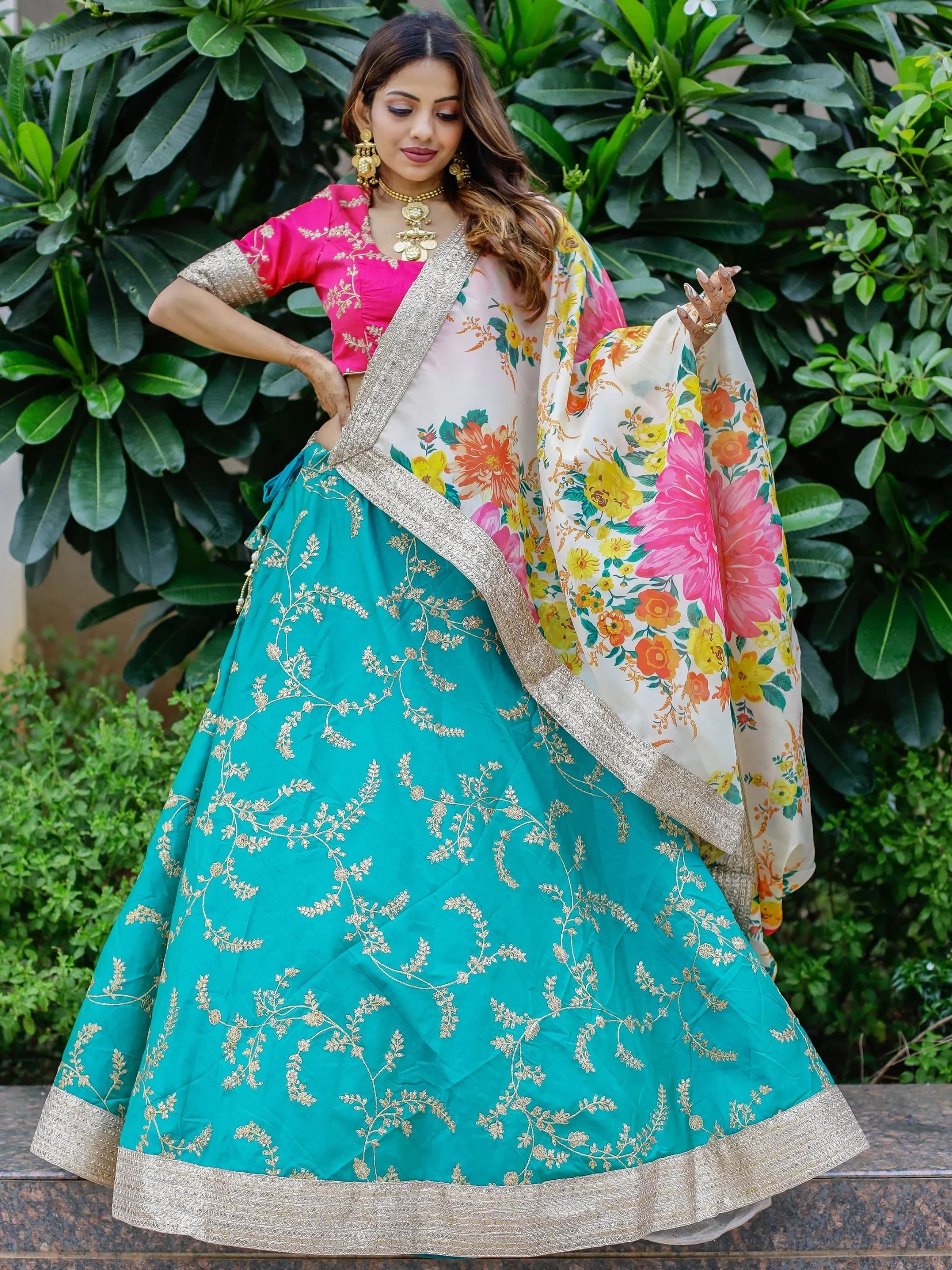Teal lehenga with gold embroidery, pink blouse, floral dupatta — Indian ethnic wear