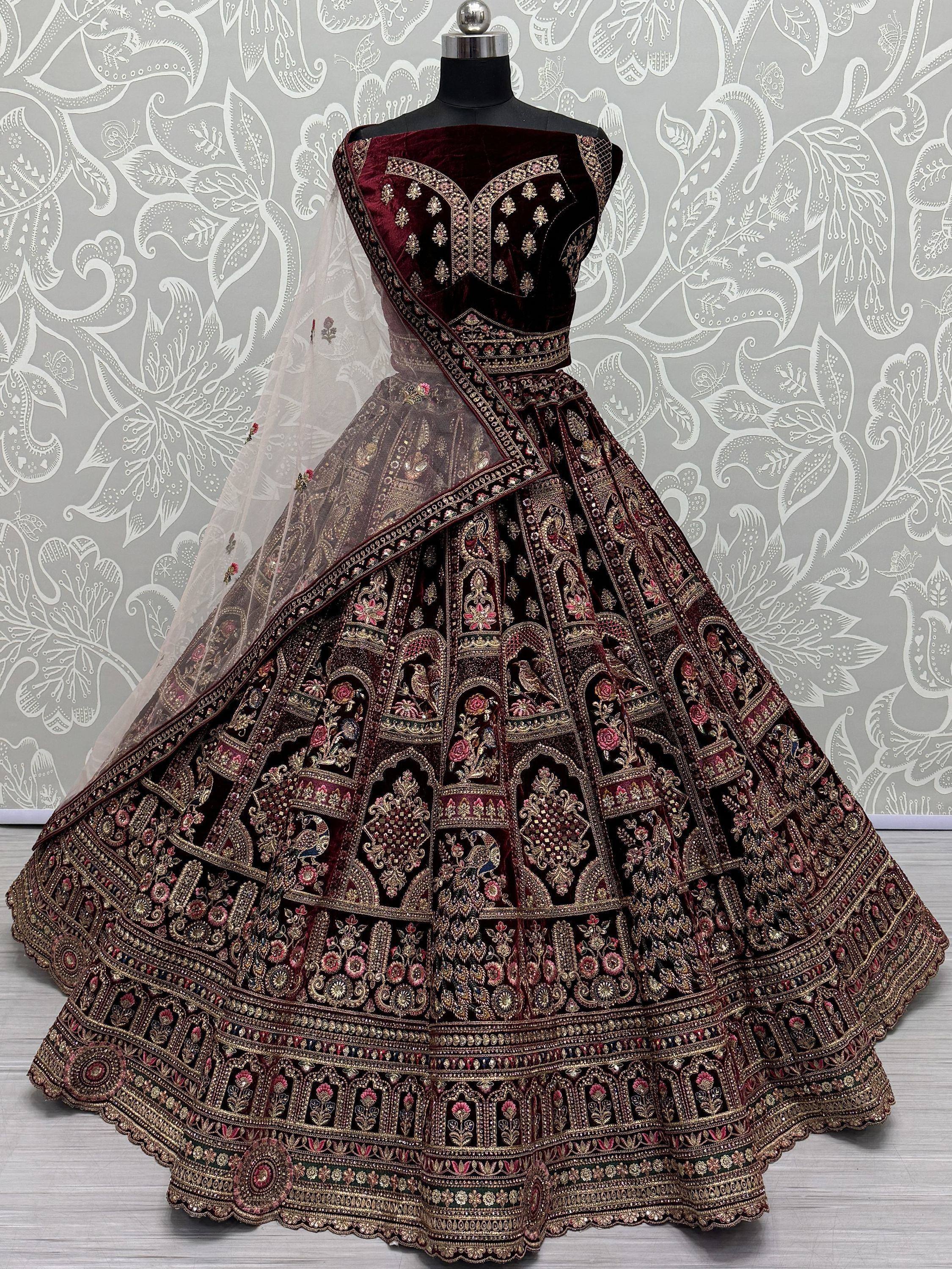 Maroon velvet designer lehenga choli with heavy gold embroidery and net dupatta, Indian ethnic wear