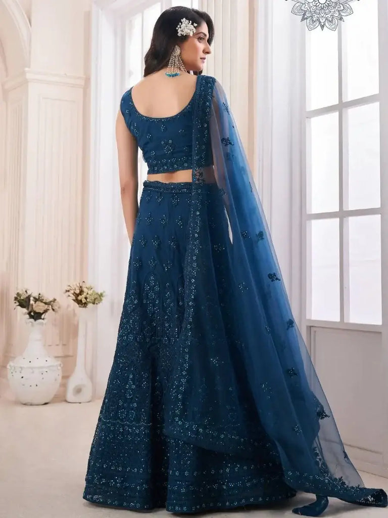 Beauteous Navy Blue Dori Embroidered Net Engagement Wear Lehenga Choli