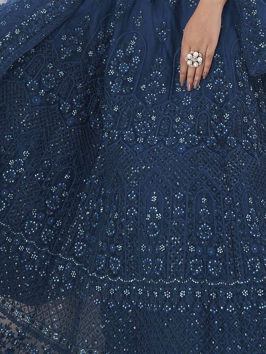 Navy blue embroidered lehenga with sequins and lace detailing, paired with pearl ring