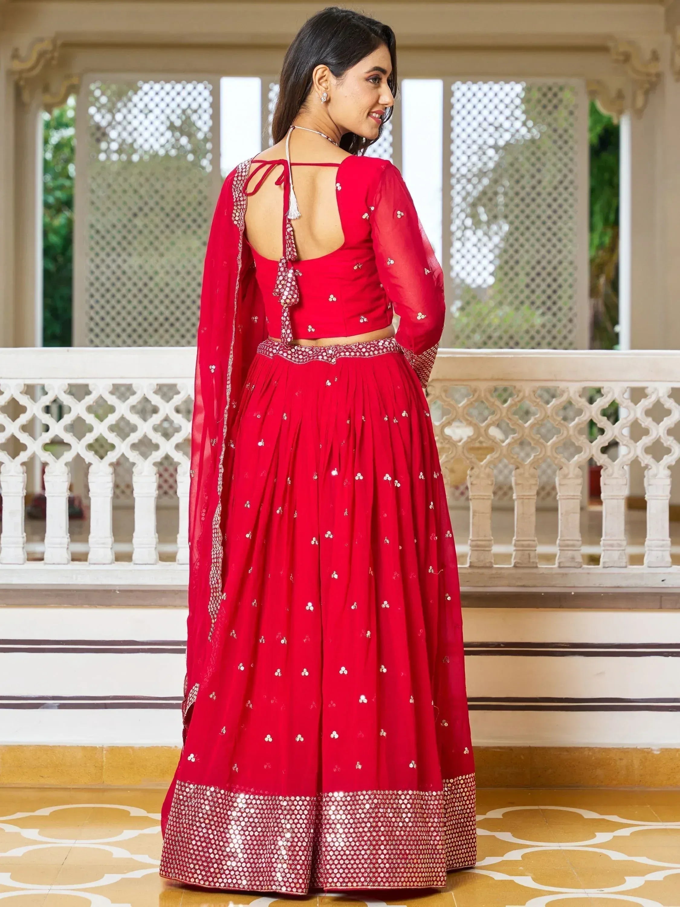 Red designer lehenga choli with back tie blouse and sequin embroidery, ethnic Indian wear