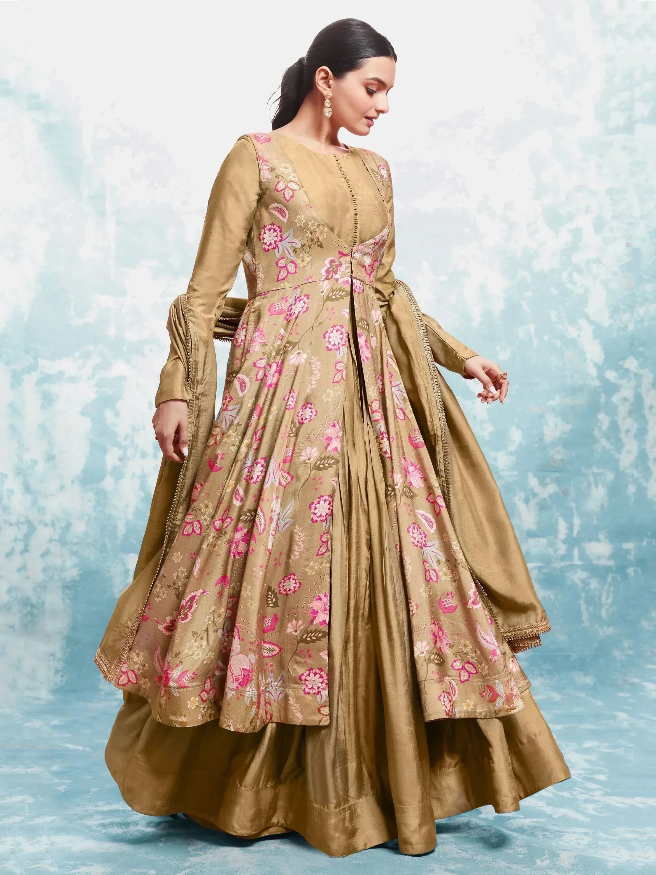Elegant gold anarkali with pink floral print, perfect for Indian ethnic wear and festive occasions.
