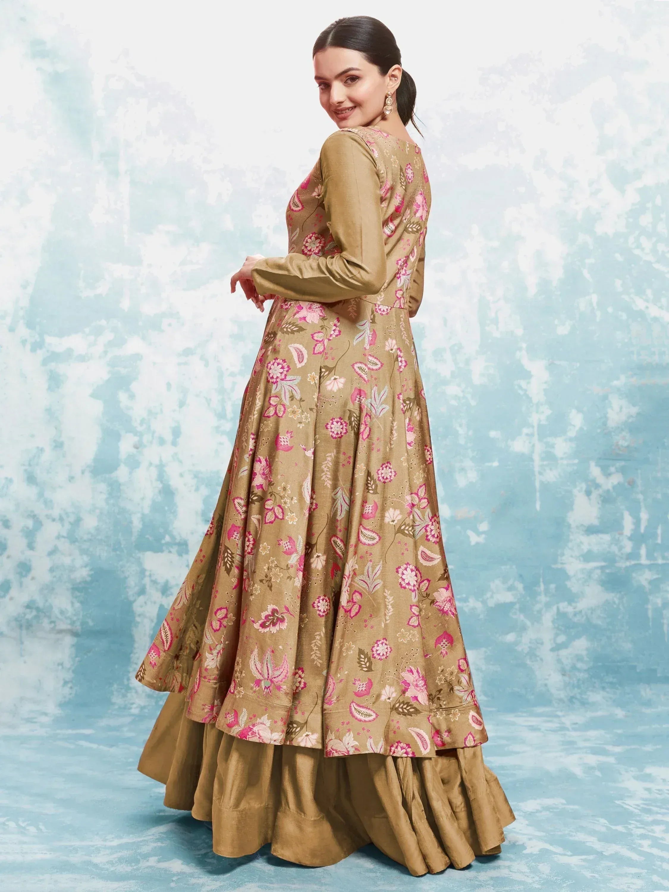 Woman in olive green floral anarkali with pink print, ethnic Indian wear for festive occasions