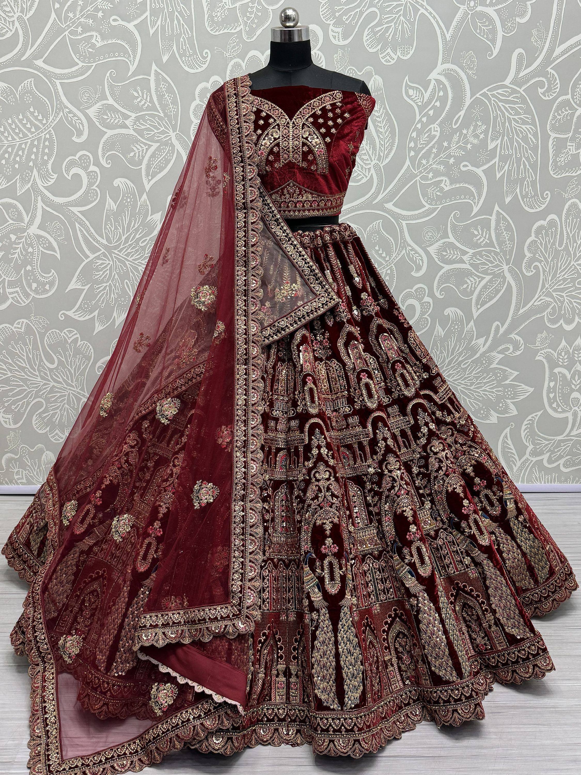 Maroon velvet lehenga choli with heavy gold embroidery and sheer dupatta, Indian ethnic wear
